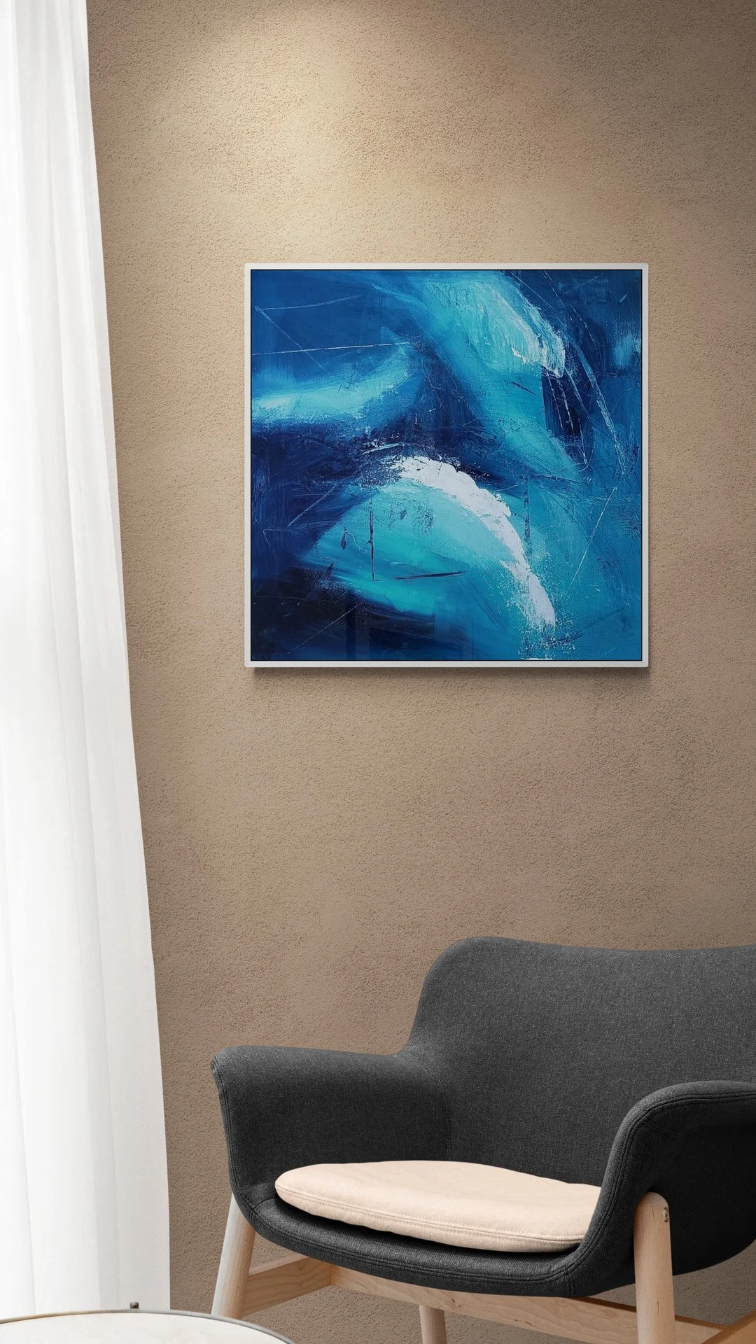 comfy-chair-next-to-spotlit-wall.jpg