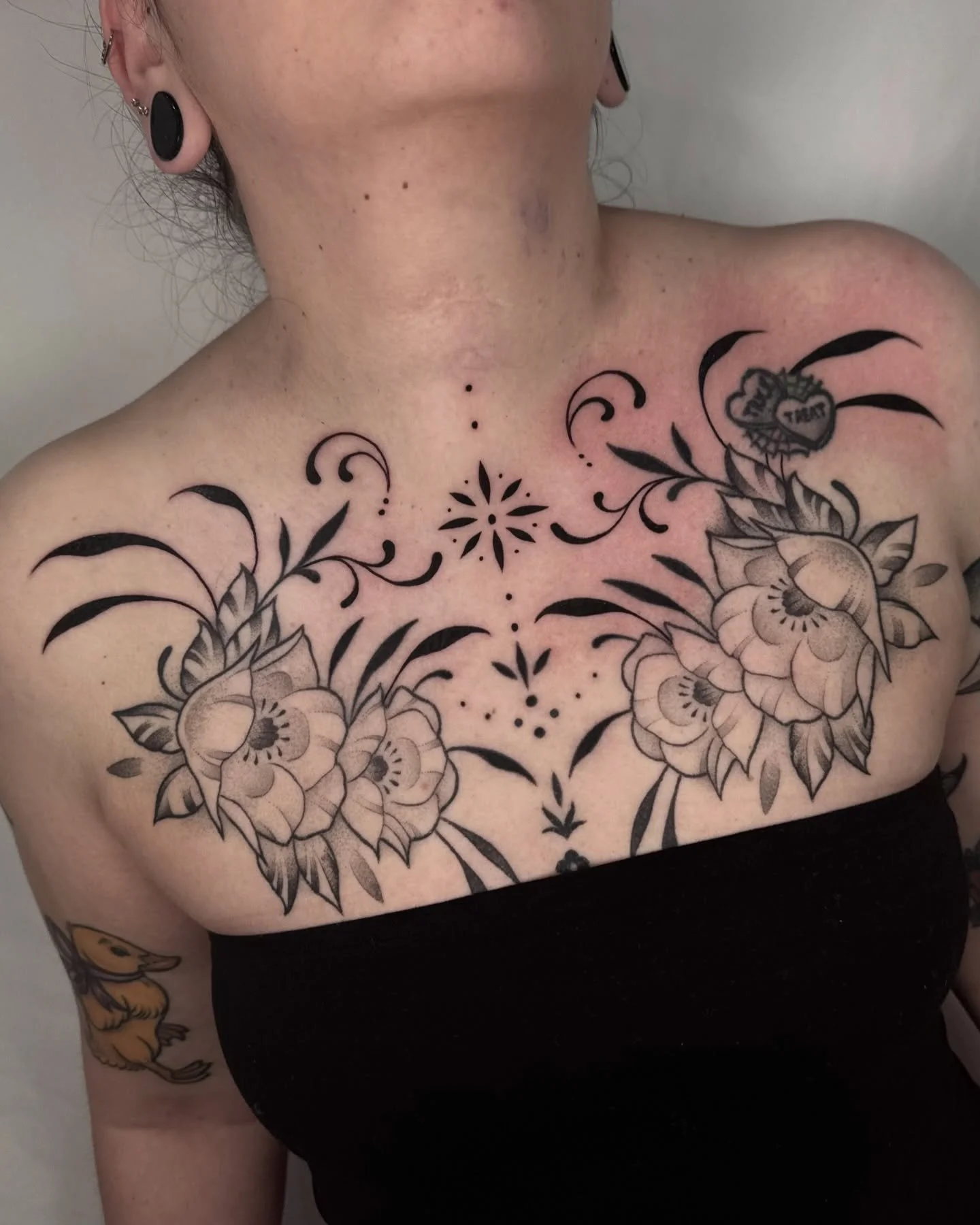 Today we added extra ornamentals to a chest piece previously done and now healed by me! 🖤🖤🖤
