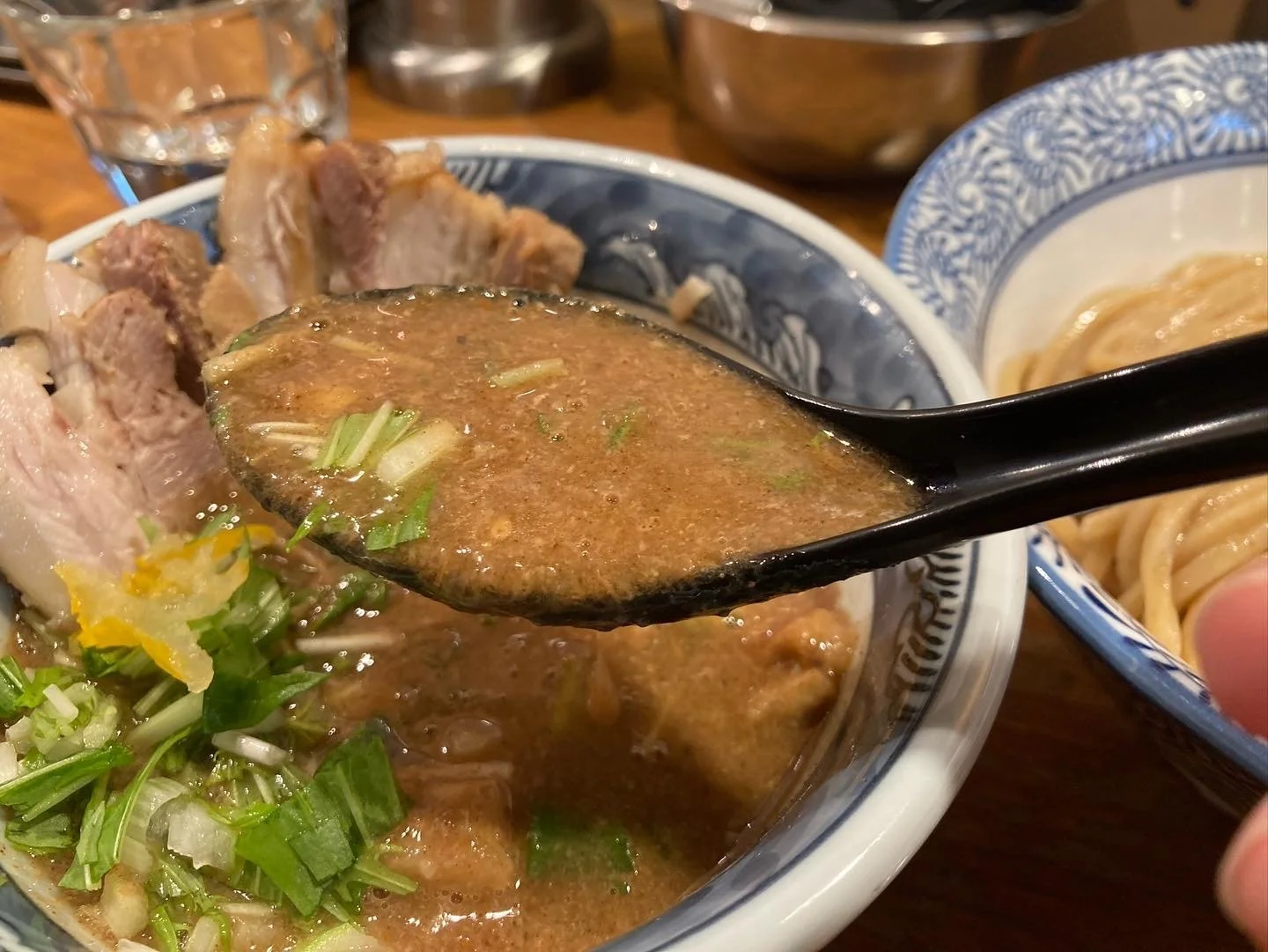 Thick and meaty soup of the tsukemen at Dogenzaka Mammoth in Shibuya.