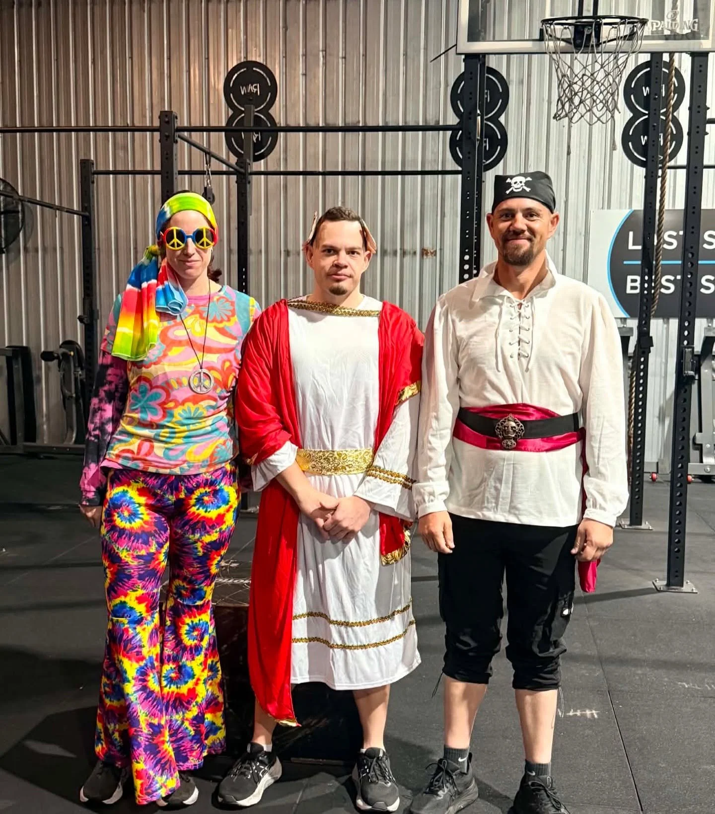 Members having fun in creative costumes during a themed community dress-up day at RevFit gym in Taminda Tamworth gym.