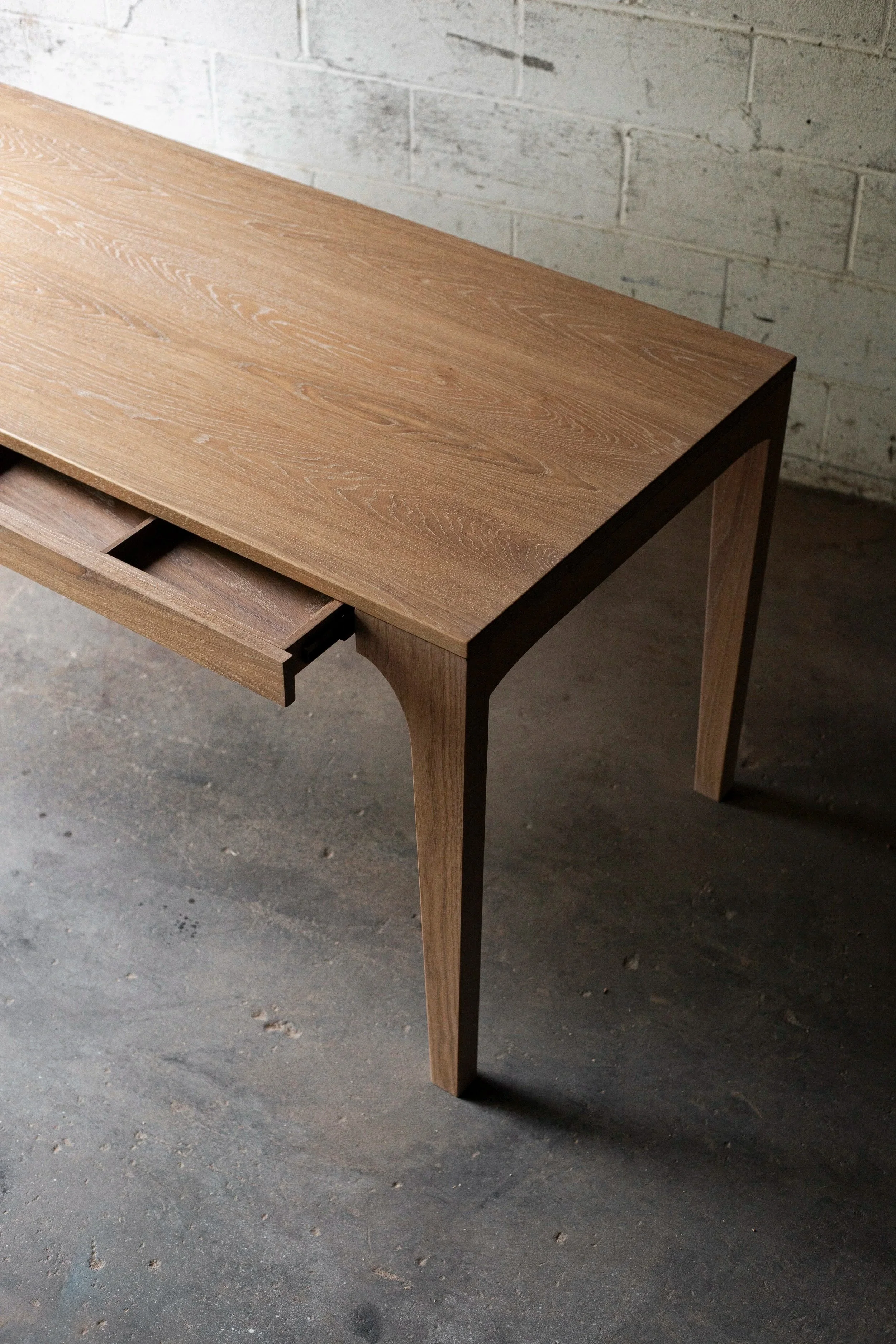 modern white oak desk with integrated drawer