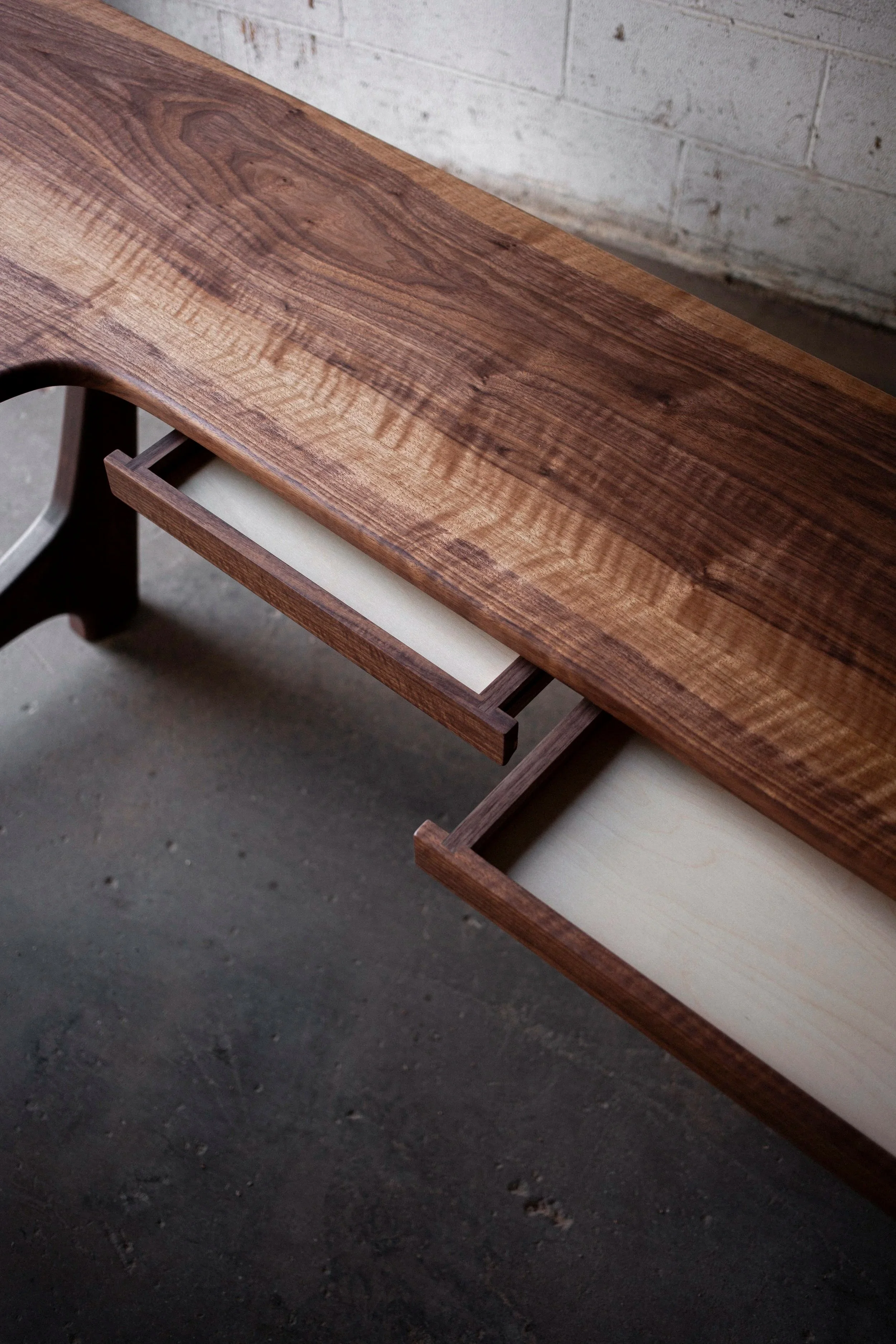 figured walnut desk with two hidden drawers
