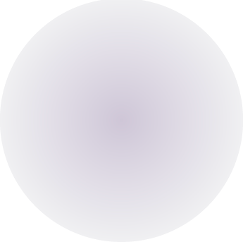 Close-up of a white, round paper plate with a blurred background.