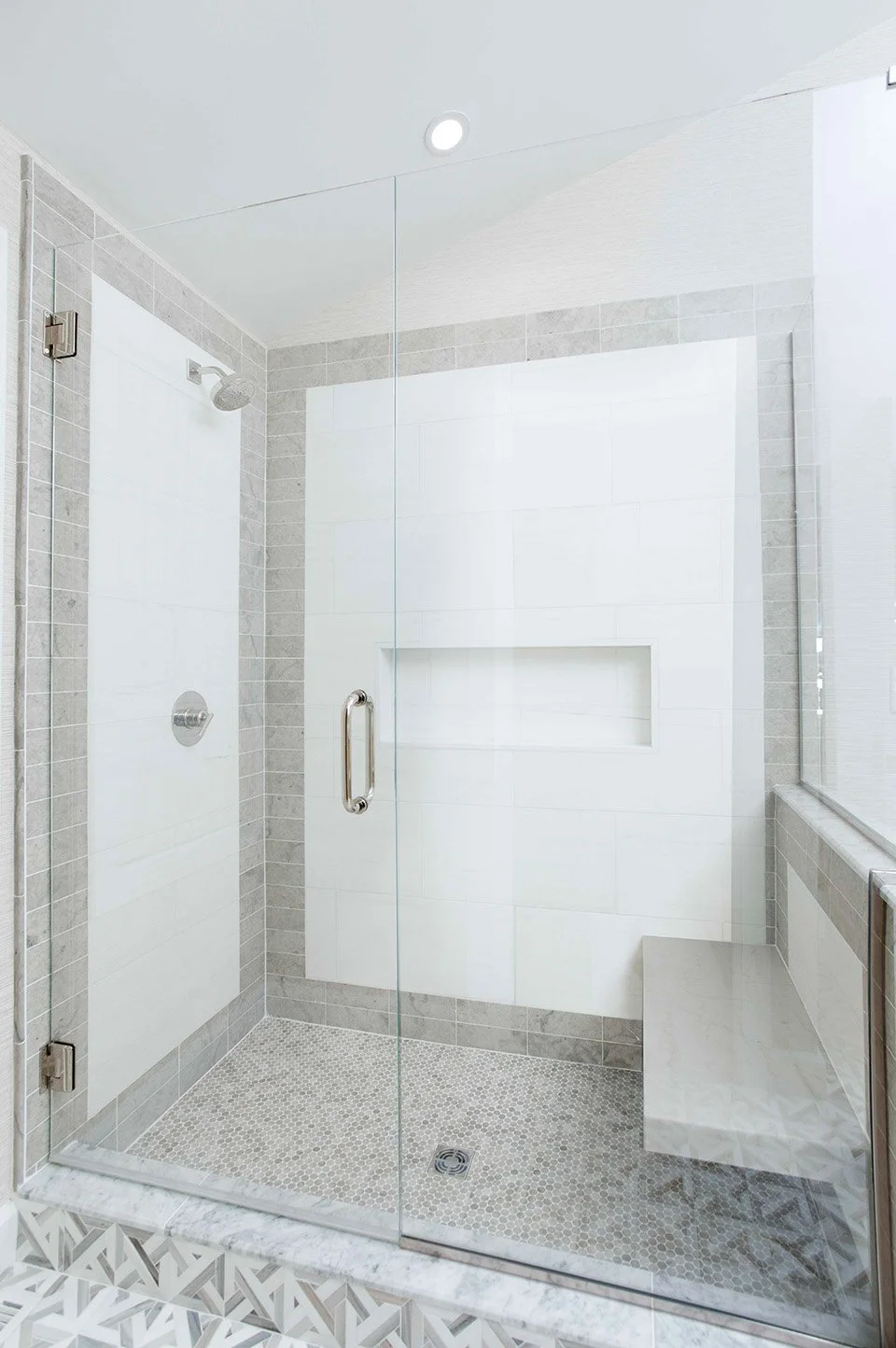Bright lakehouse bathroom with white subway tile, clean white cabinetry, and simple refined fixtures in a light and airy space | Ducy Design