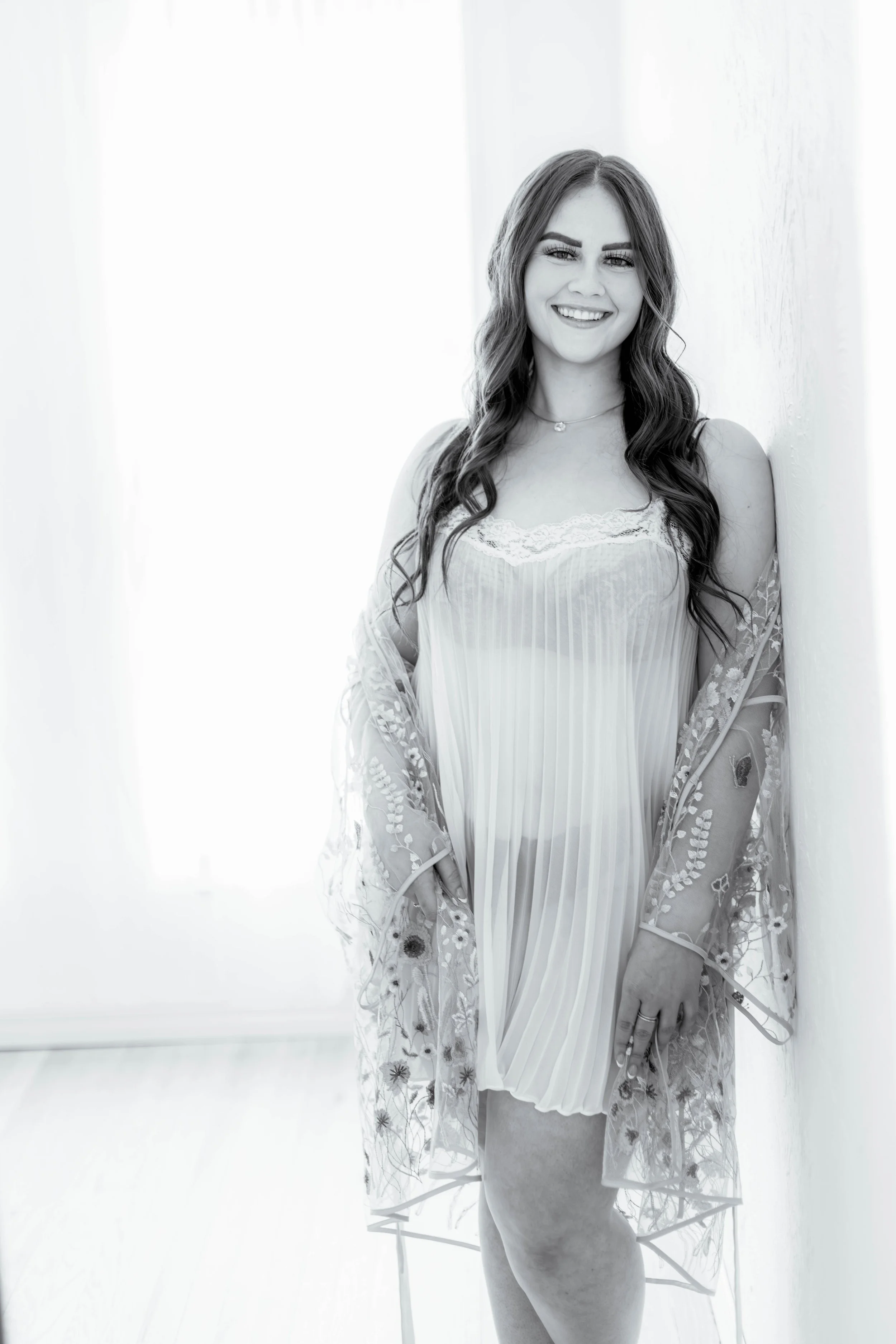 All smiles, this sultry dark-haired beauty, is relaxed and happy to find her unique style in front of the camera.