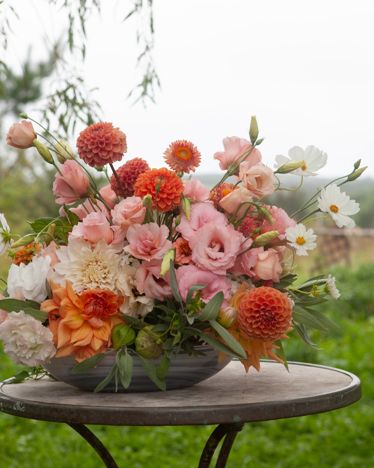 Nothing completes a luncheon table-scape like a bowl brimming with lisianthus, dahlias, sage and dollops of tomatillos, because I love their bulbous charm.

This very challenging growing season is coming to a close, so if you have a special occasion 