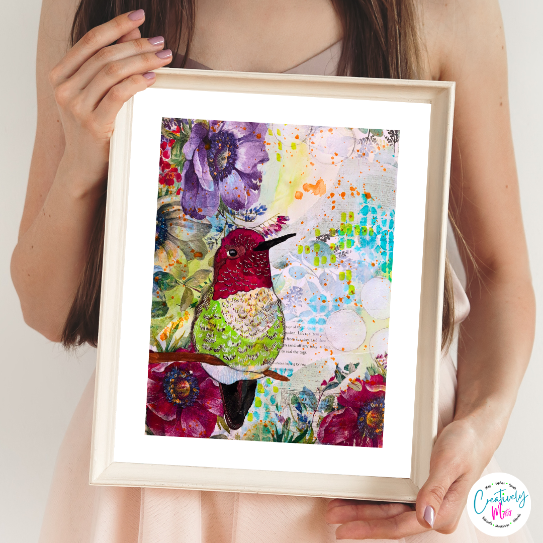 Framed Winged Wonder Limited Edition Giclee Print being held by a woman