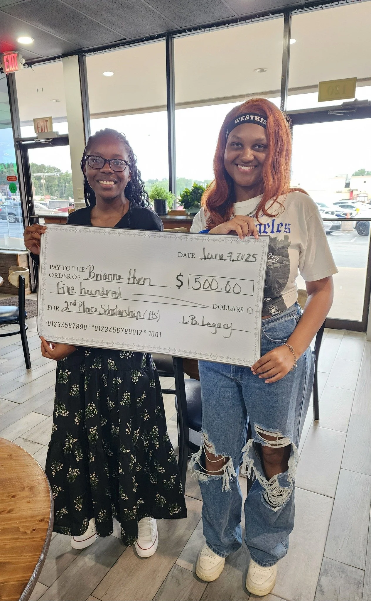 Brianna Horn, LB Legacy High School Scholarship 2nd place recipient, pictured with her friend!