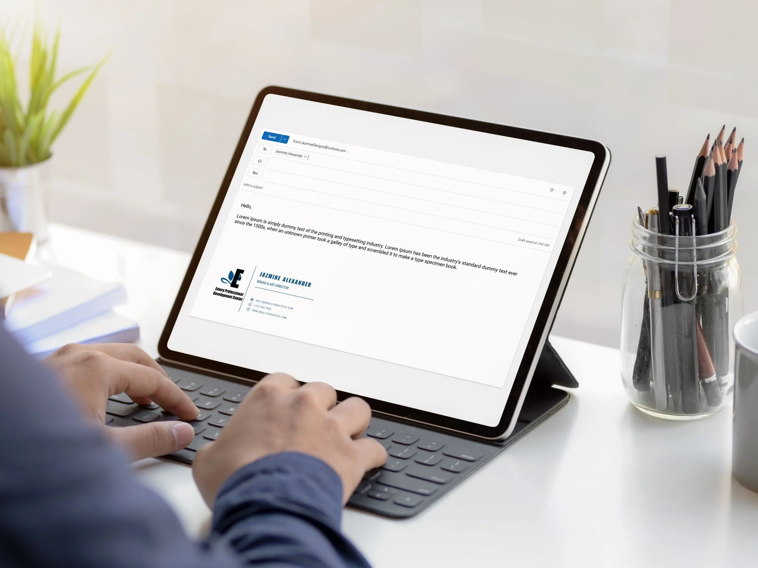Free+Person+Working+on+Digital+Tablet+Mockup.jpg