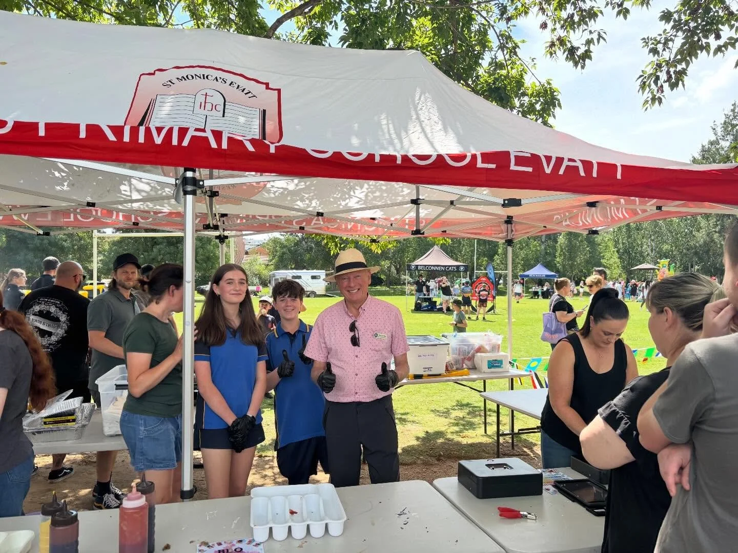 Handing on my serving duties at the BBQ stall at Saturday&rsquo;s St Monica&rsquo;s Primary School Fete!