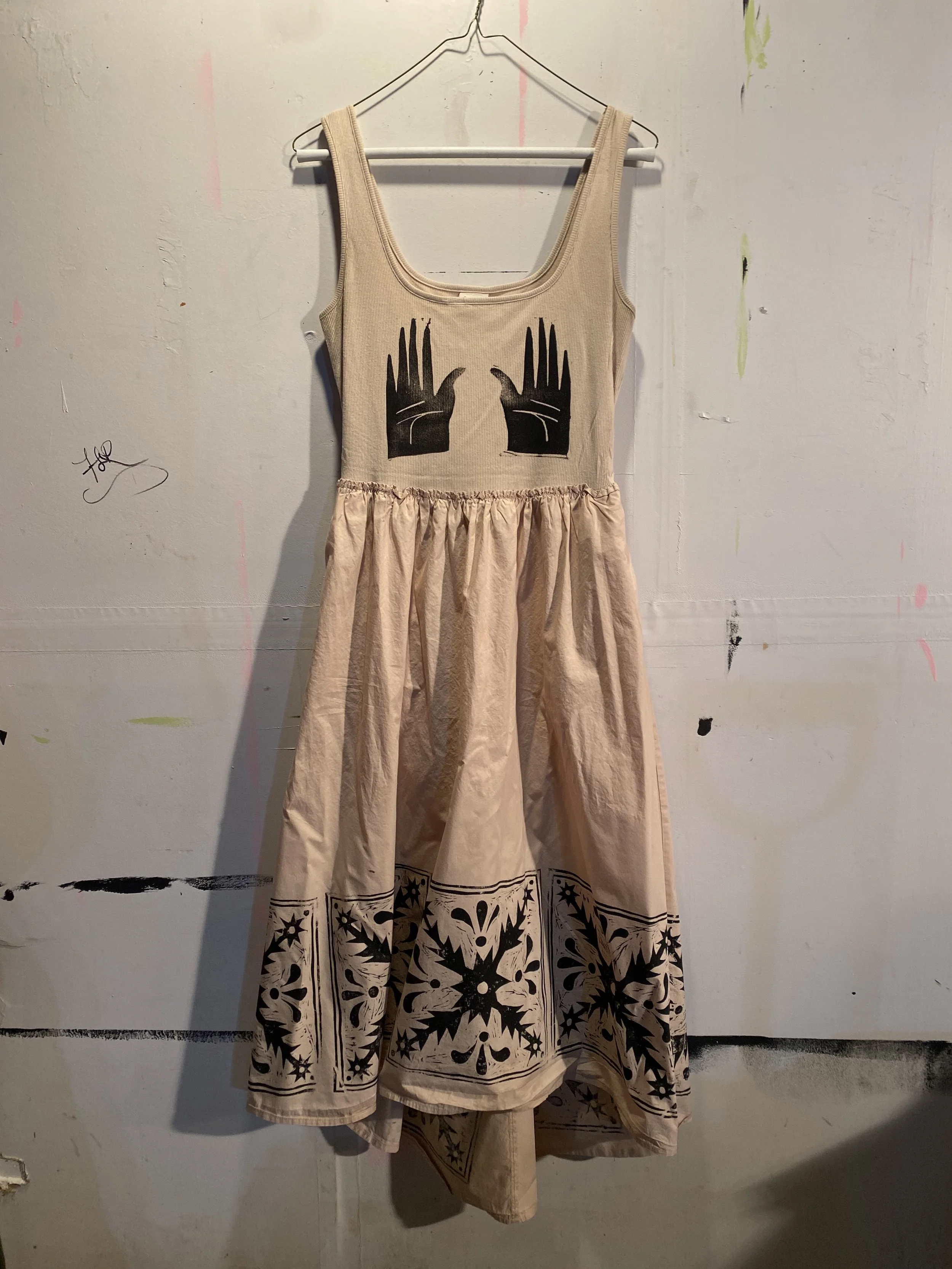 Hand and tile dress