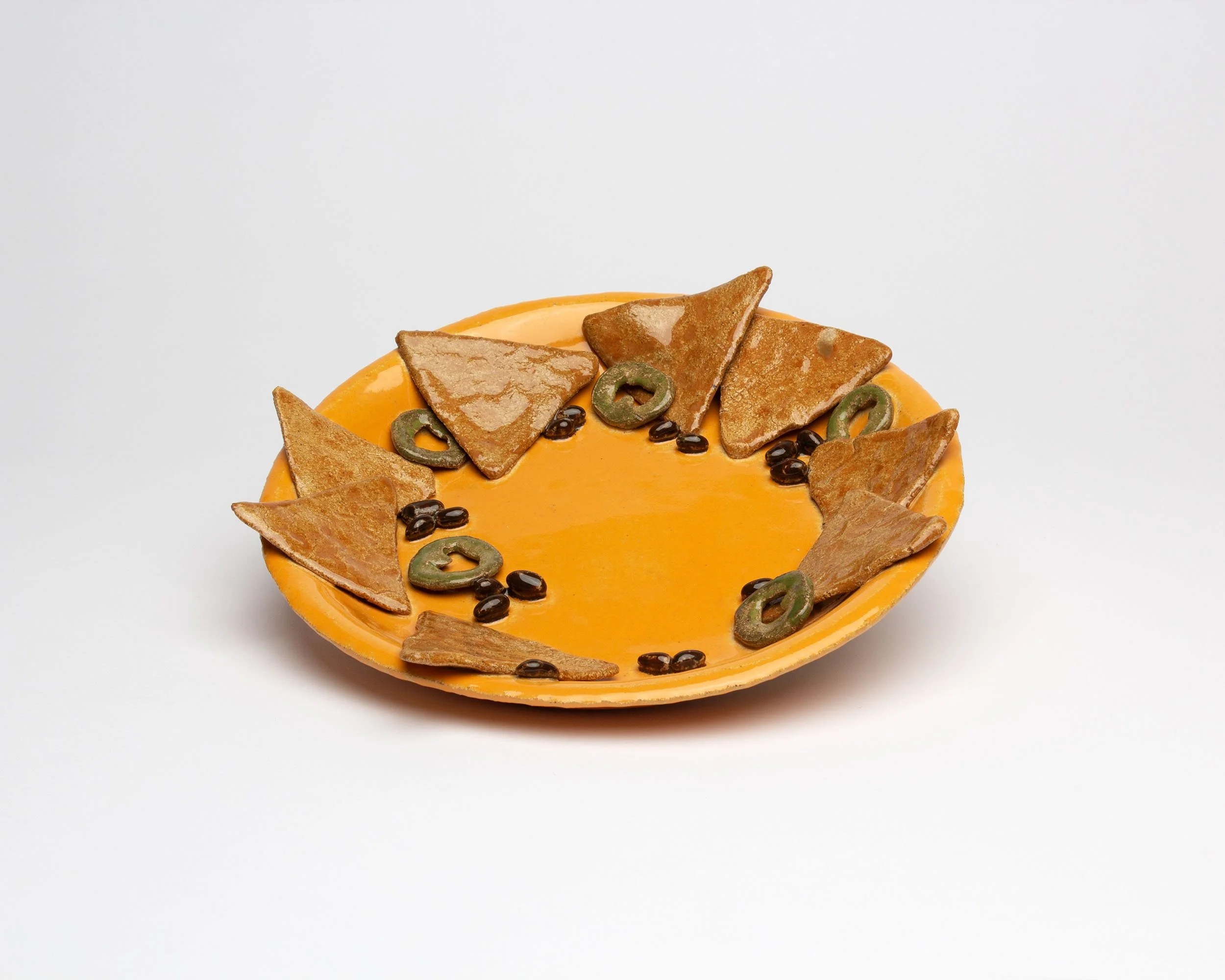 Leftover Nacho Plate, 2026, ceramic, 10'x9.5"x2"