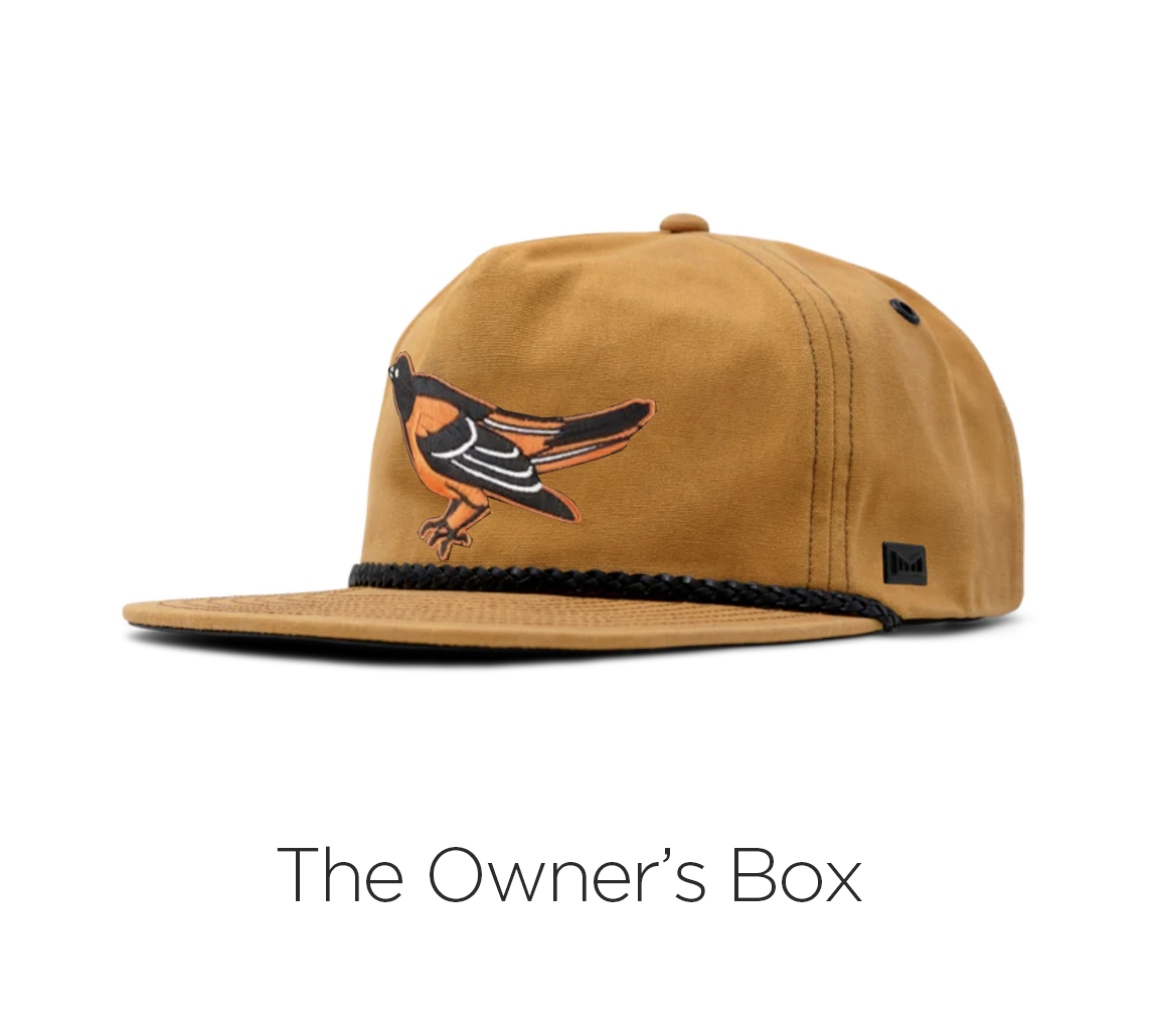 This hat, crafted from waxed canvas, is a nod to Elaine's ill-fated Yankees game adventure and her time at the J. Peterman Company. Equally at home in the jungles of the Congo or with a box of Cracker Jacks while rooting for the home team (or not), i