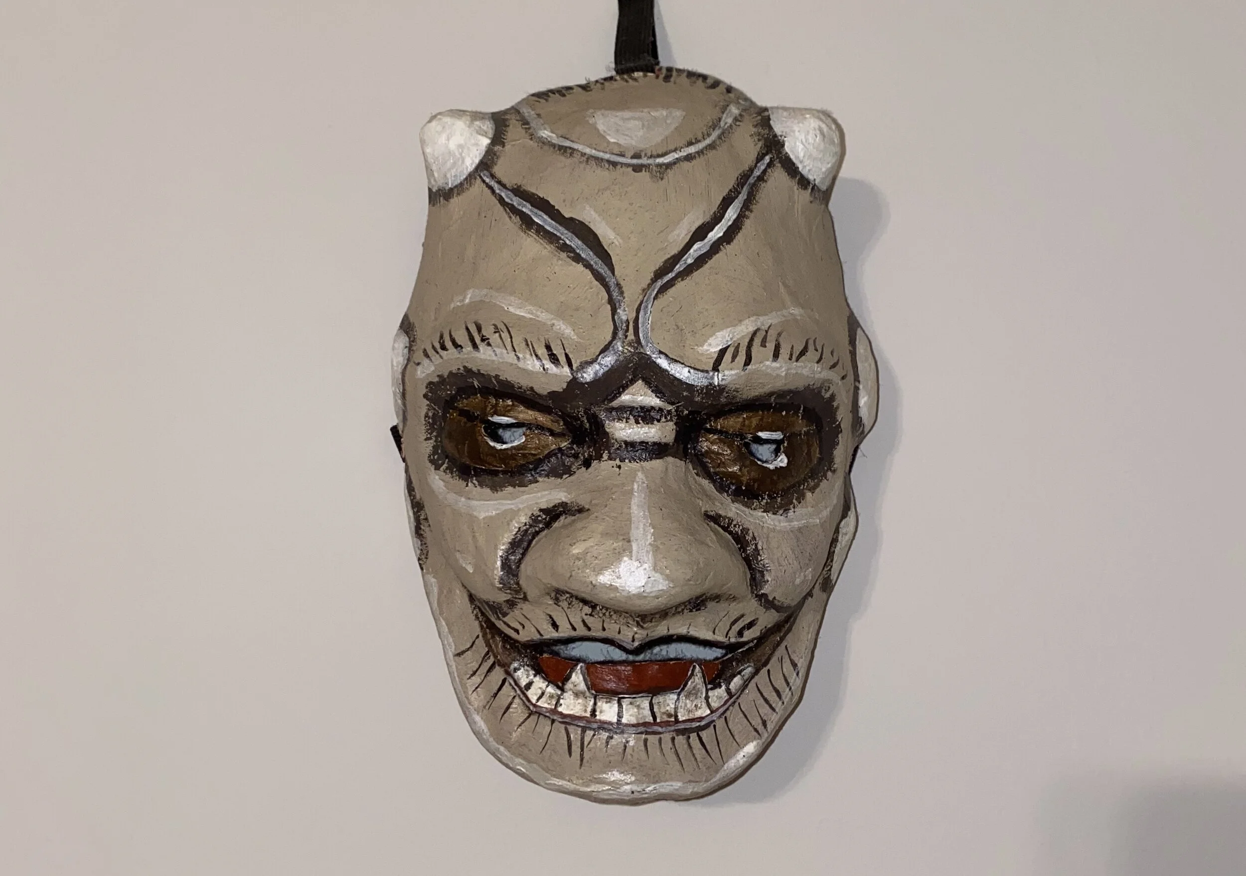 Finished mask, with FEV, felt lined, and elastic T-strap.