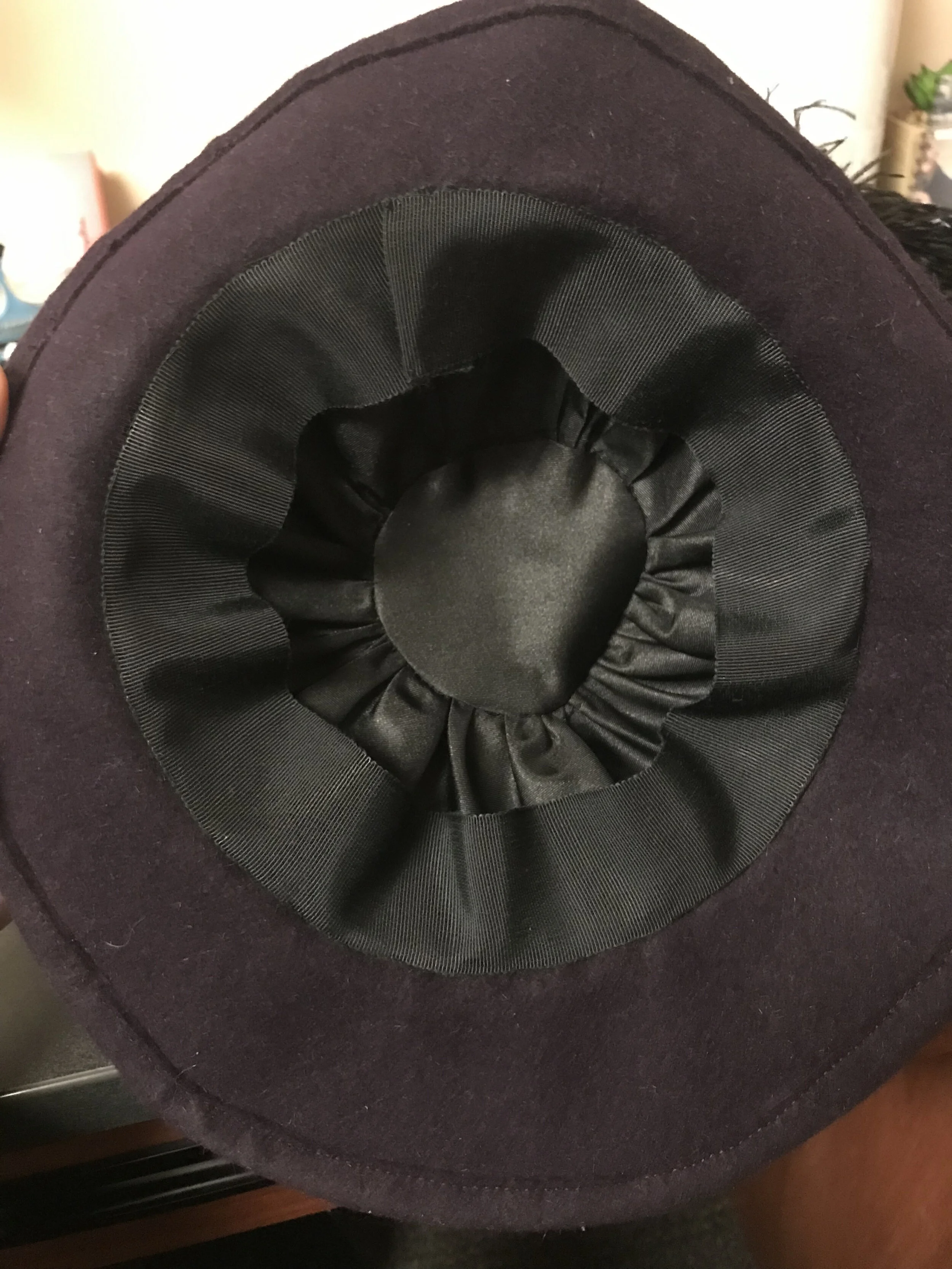 Lining and grosgrain hat band.