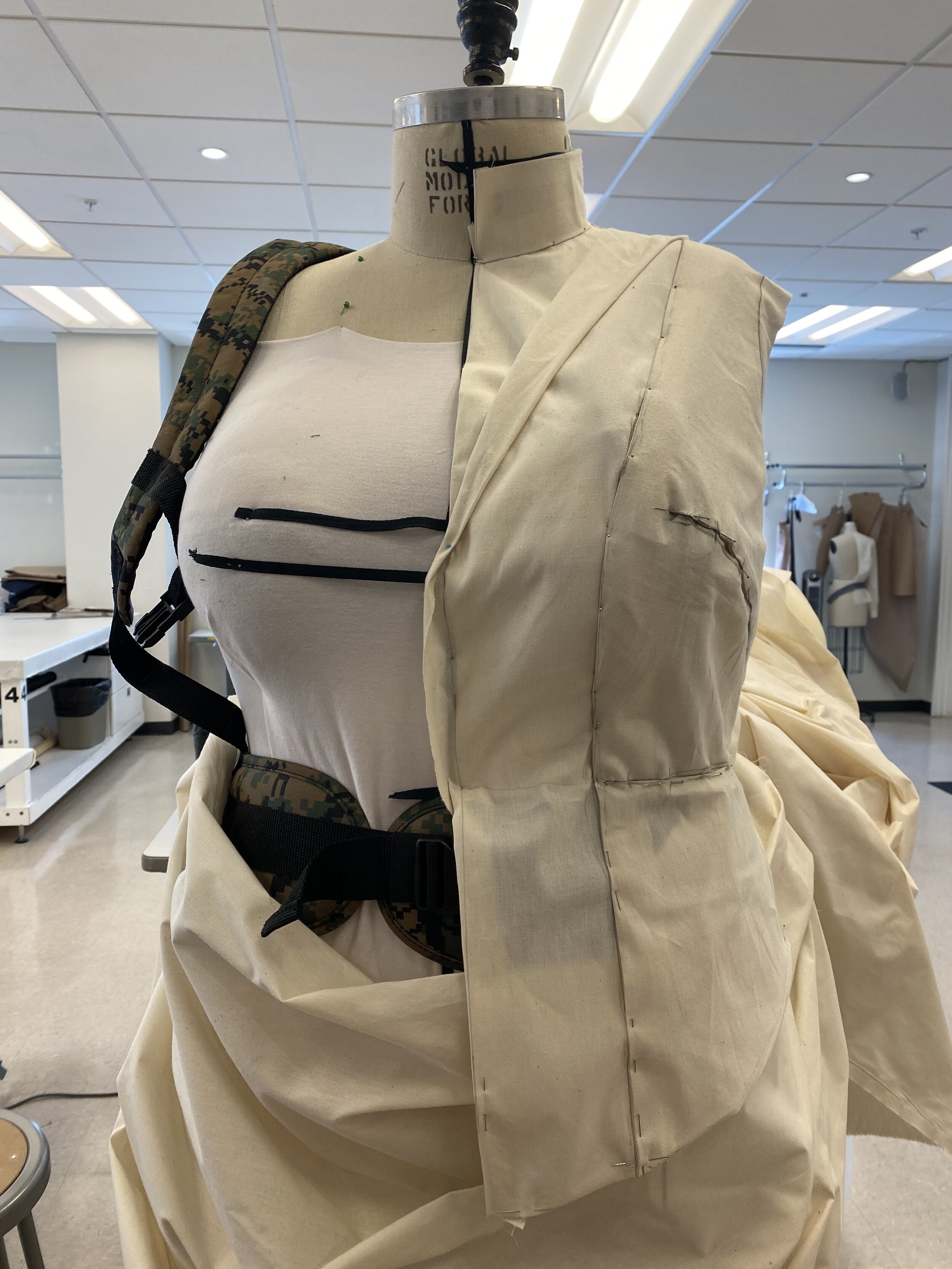 The drape for the vest layer