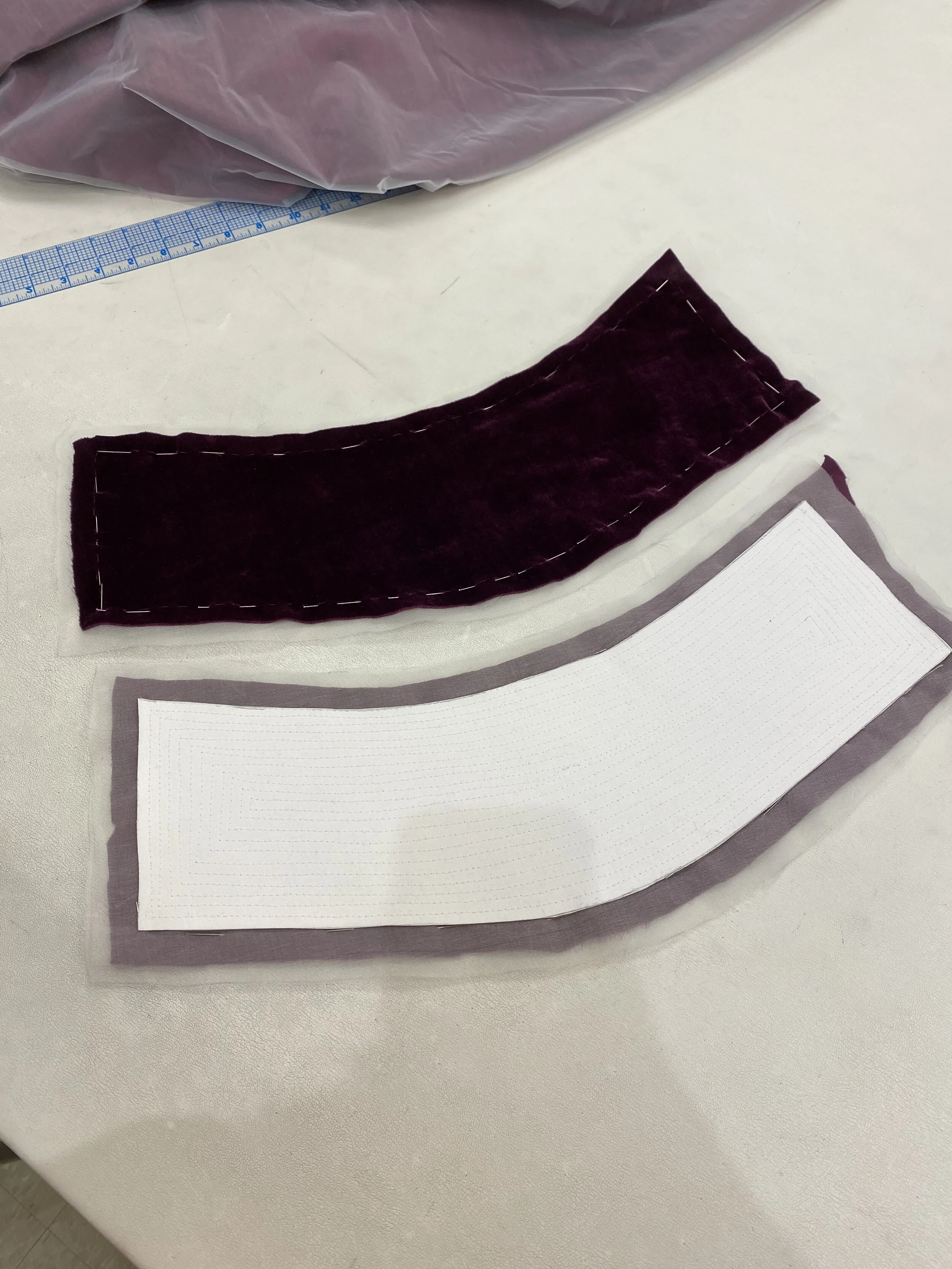 The interior of the cuffs, flatlined to organza that has been quilted to stiff stuff interfacing. 