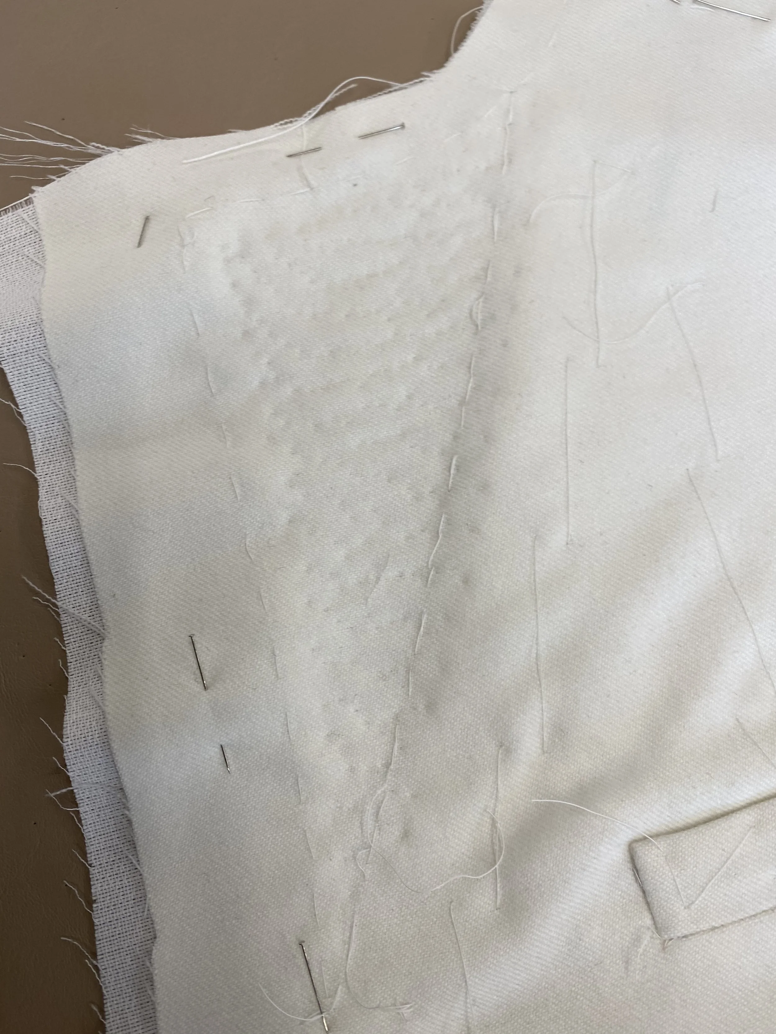 Pad stitching on the underside of the lapel