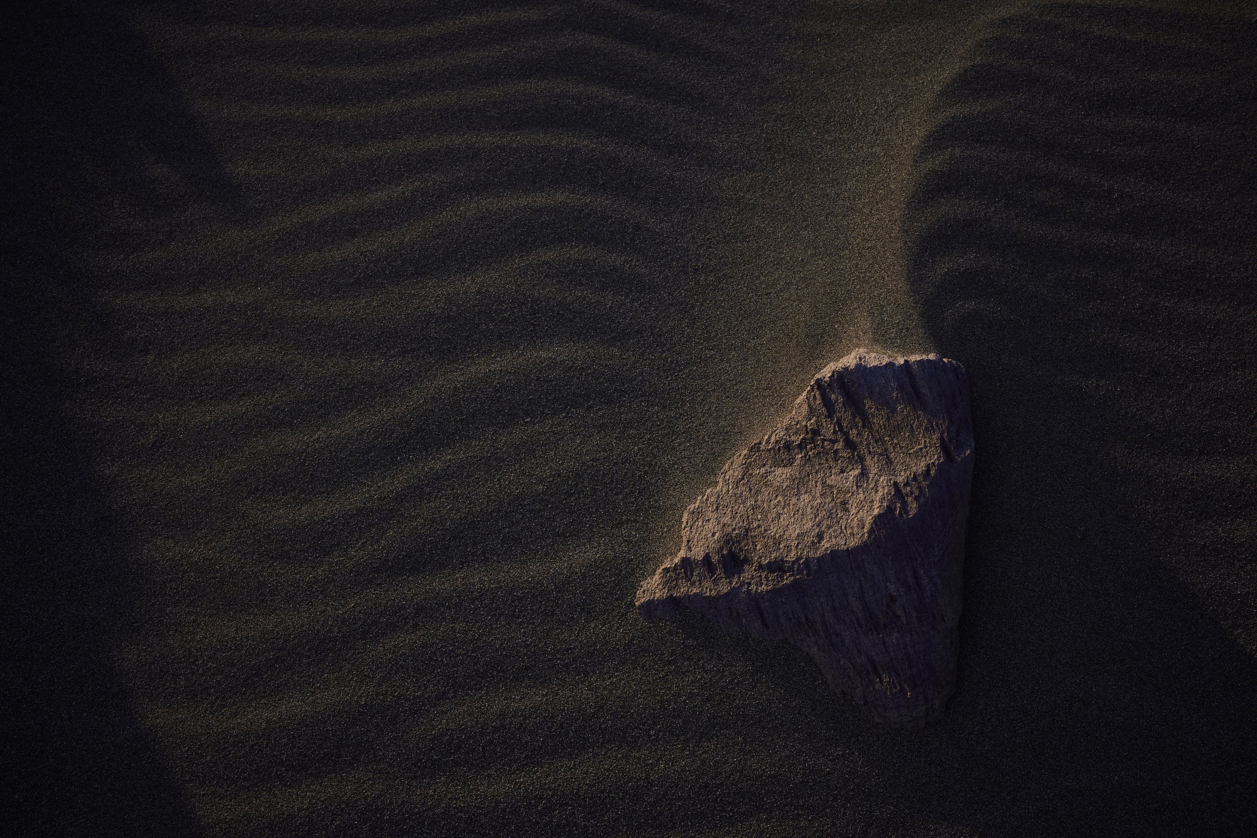 rock-in-the-sand-in-the-early-light 1.jpg