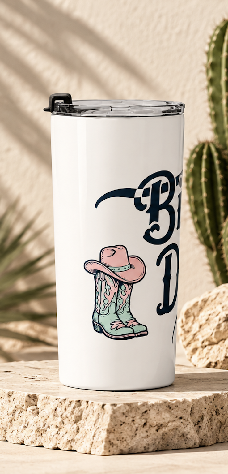 Side view of the Big Daddy The Caddie insulated travel tumbler featuring Western-inspired cowboy boots artwork and a clear spill-resistant lid.