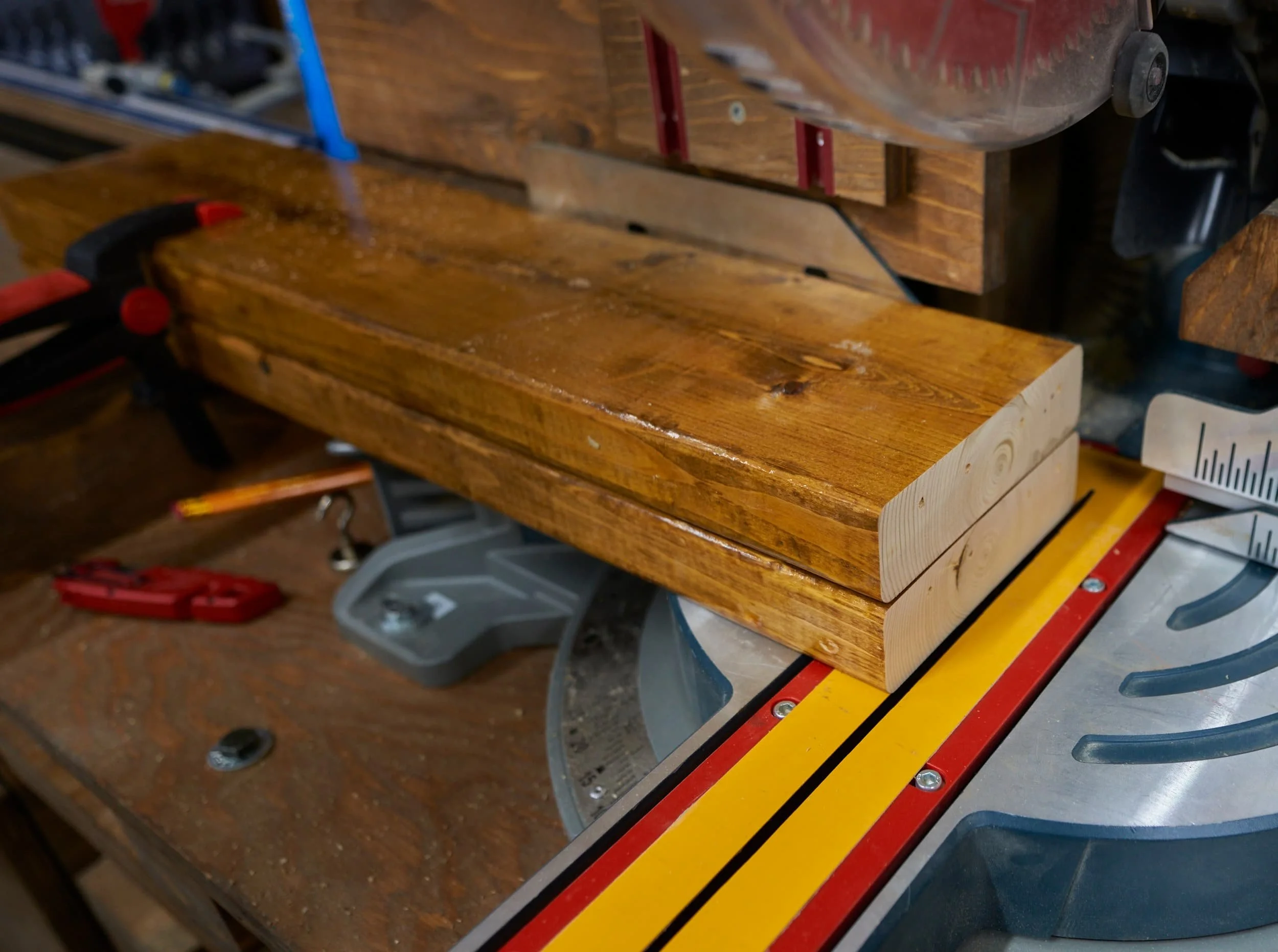 Cutting down scrap 2x6s for the perimeter