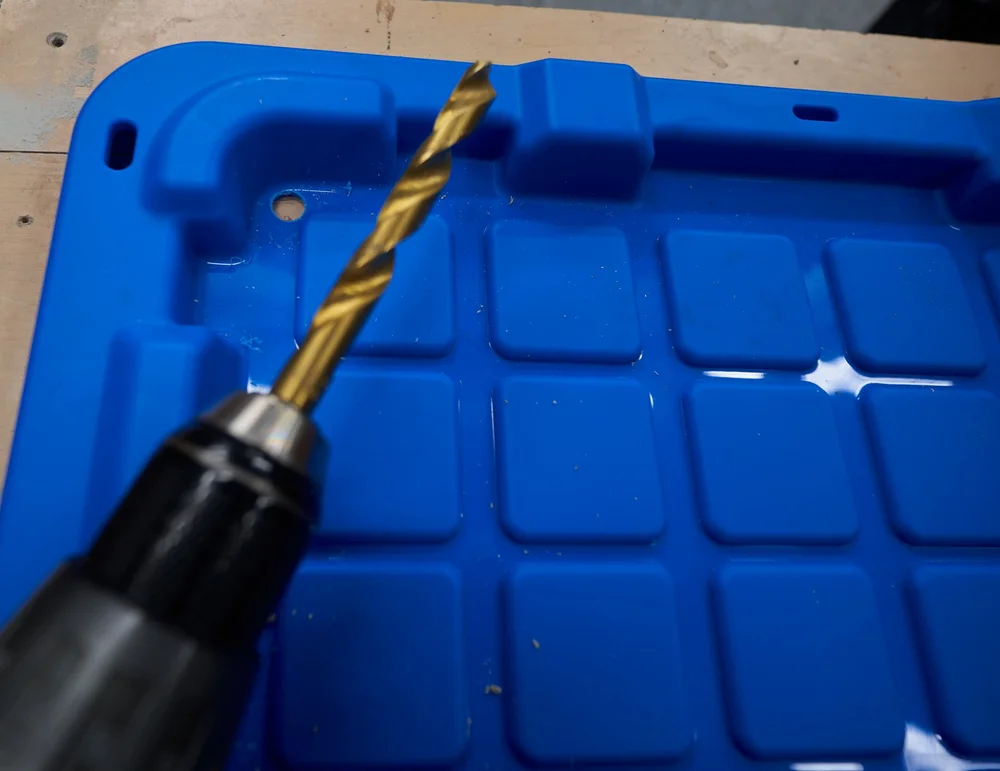 1. Drill a hole in the corner