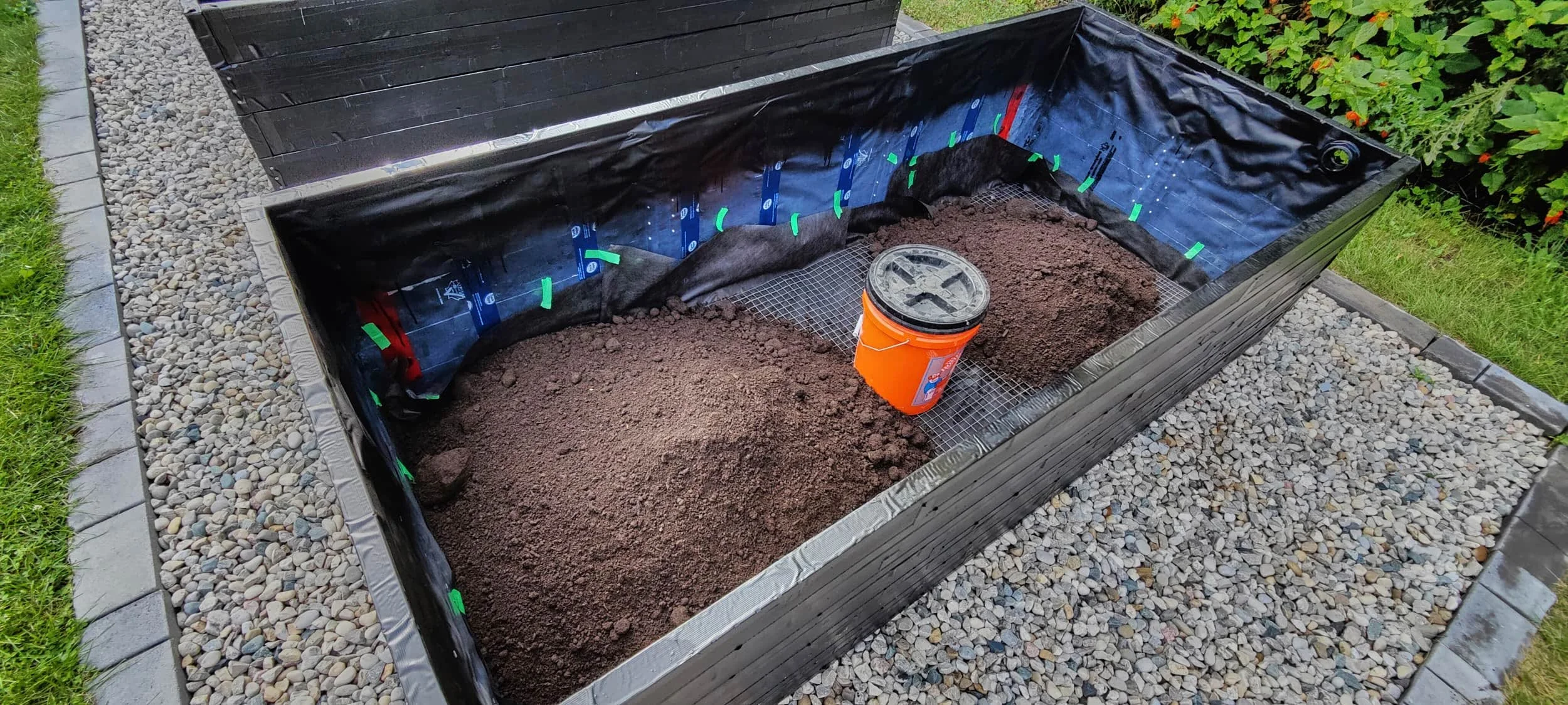 5-gal bucket as a placeholder for a composter