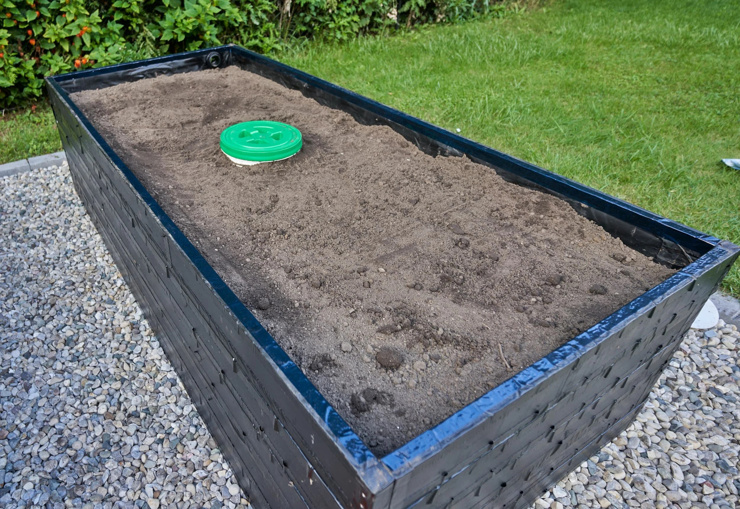 Plan is to bury the composter up to the rim