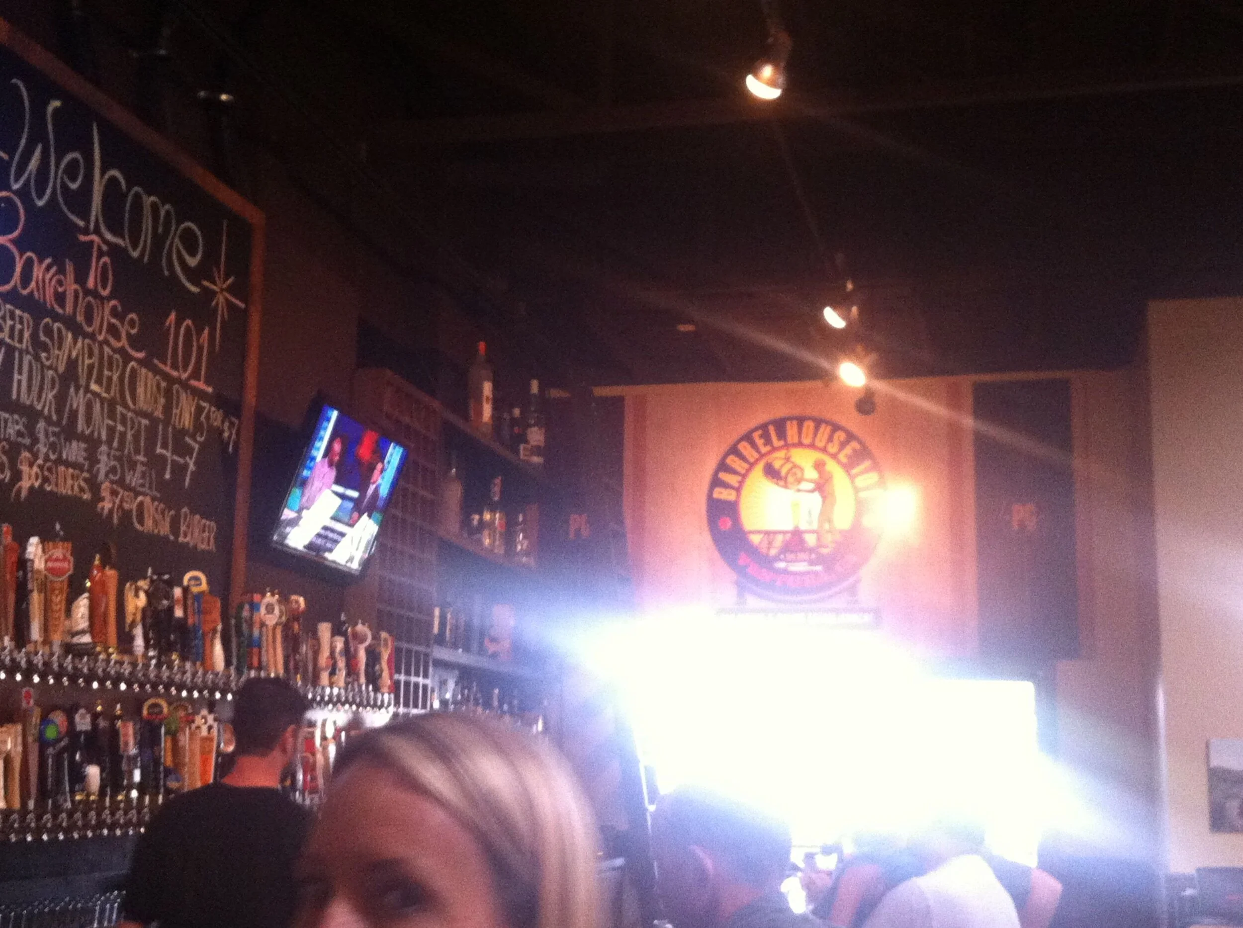 Logo panel mounted above bar.