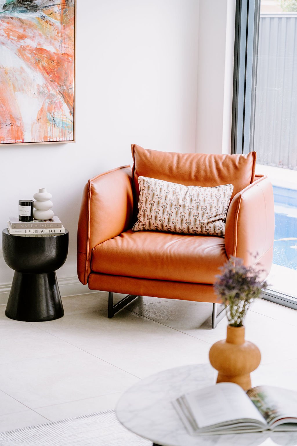 orange leather armchair artwork