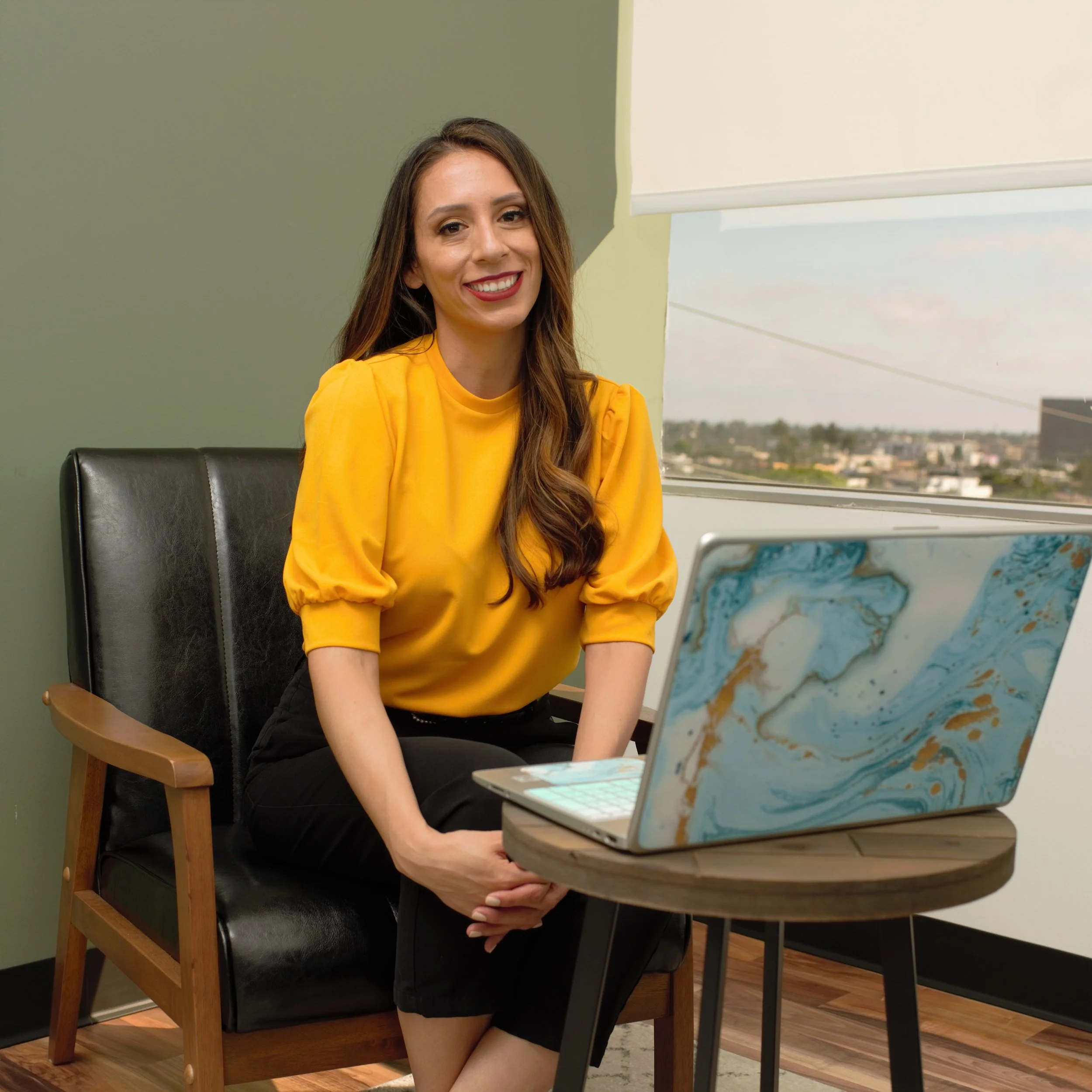 Dr. Christina Marie Ortiz, psychologist, providing secure telehealth therapy to clients across California.