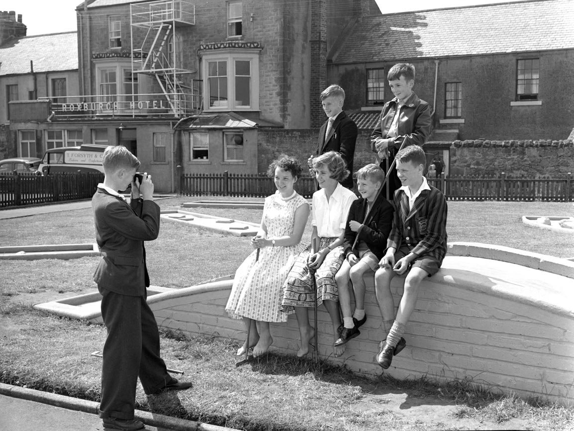 In the 1950s Spittal was a bustling place during the summer when holiday makers flocked to the beach and promenade. A group of children smile for another camera on the miniature golf course.
(August 1959) BRO 1944-1-2443-2