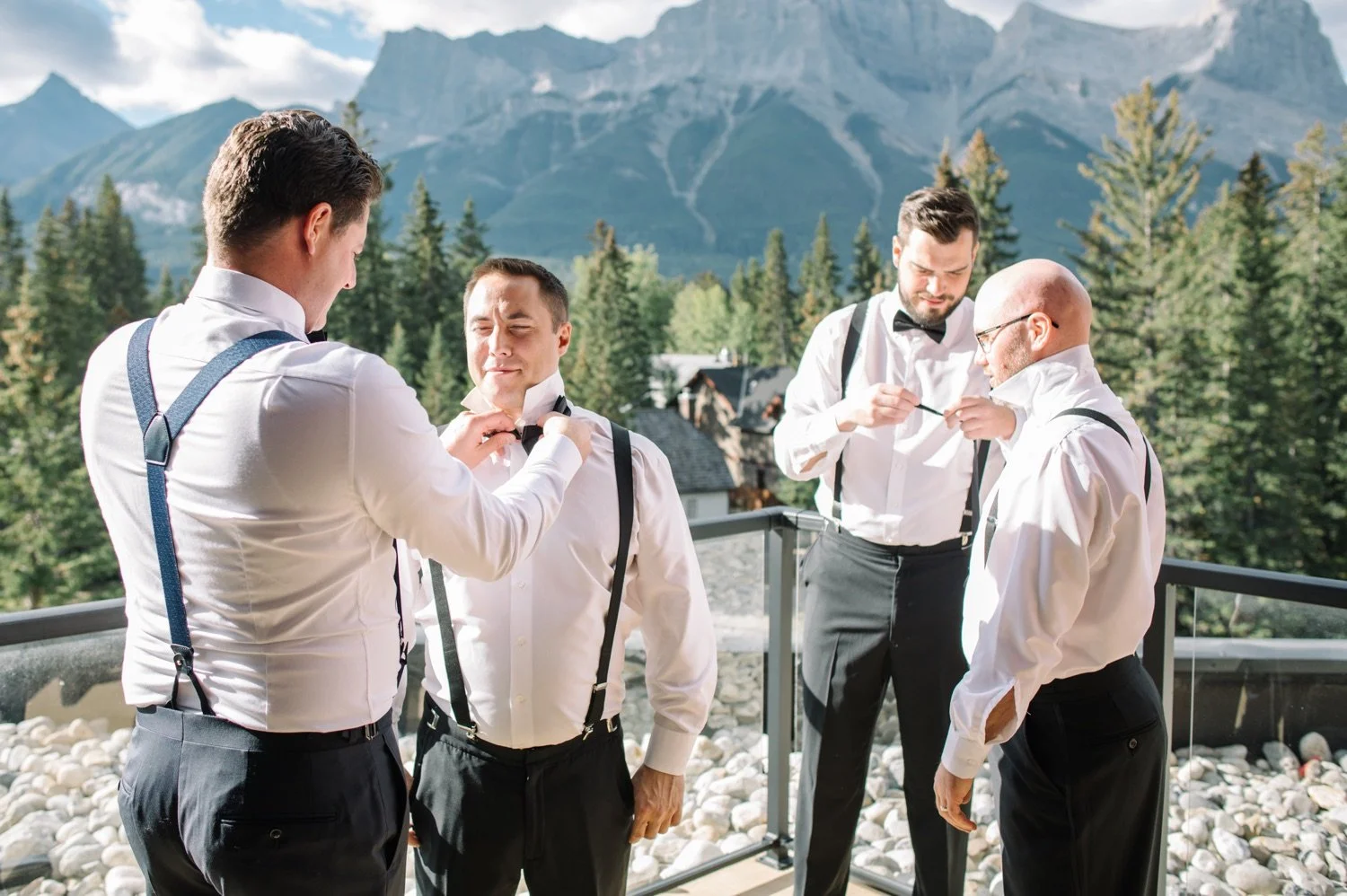 05_Andre&Haley_037_groom getting ready.jpg