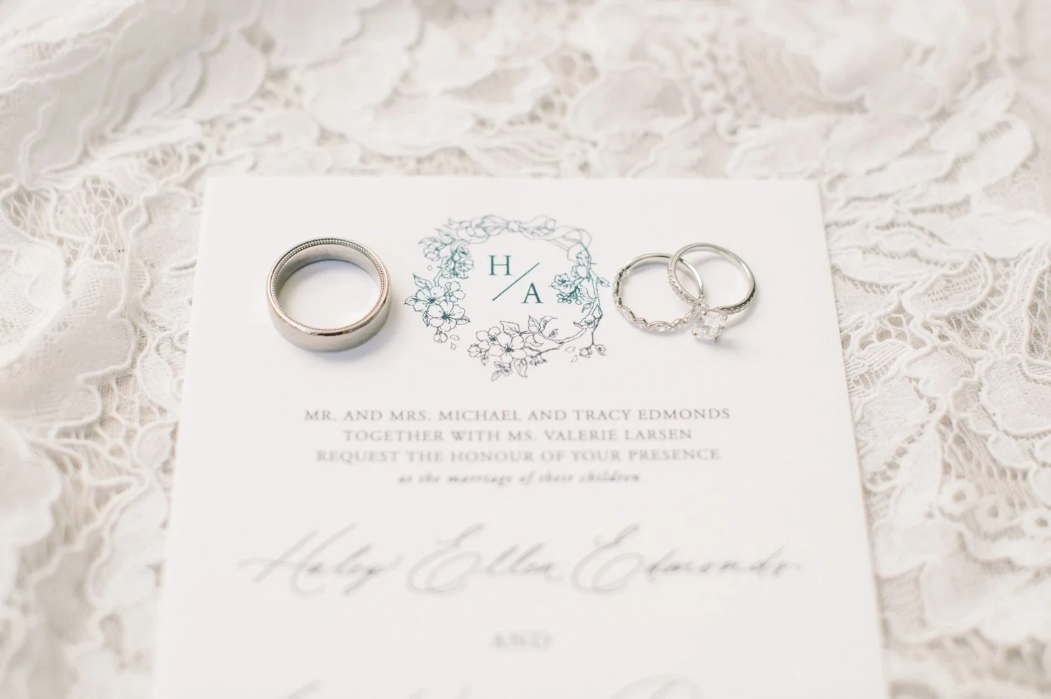 07_Andre&Haley_062_wedding rings and stationary.jpg