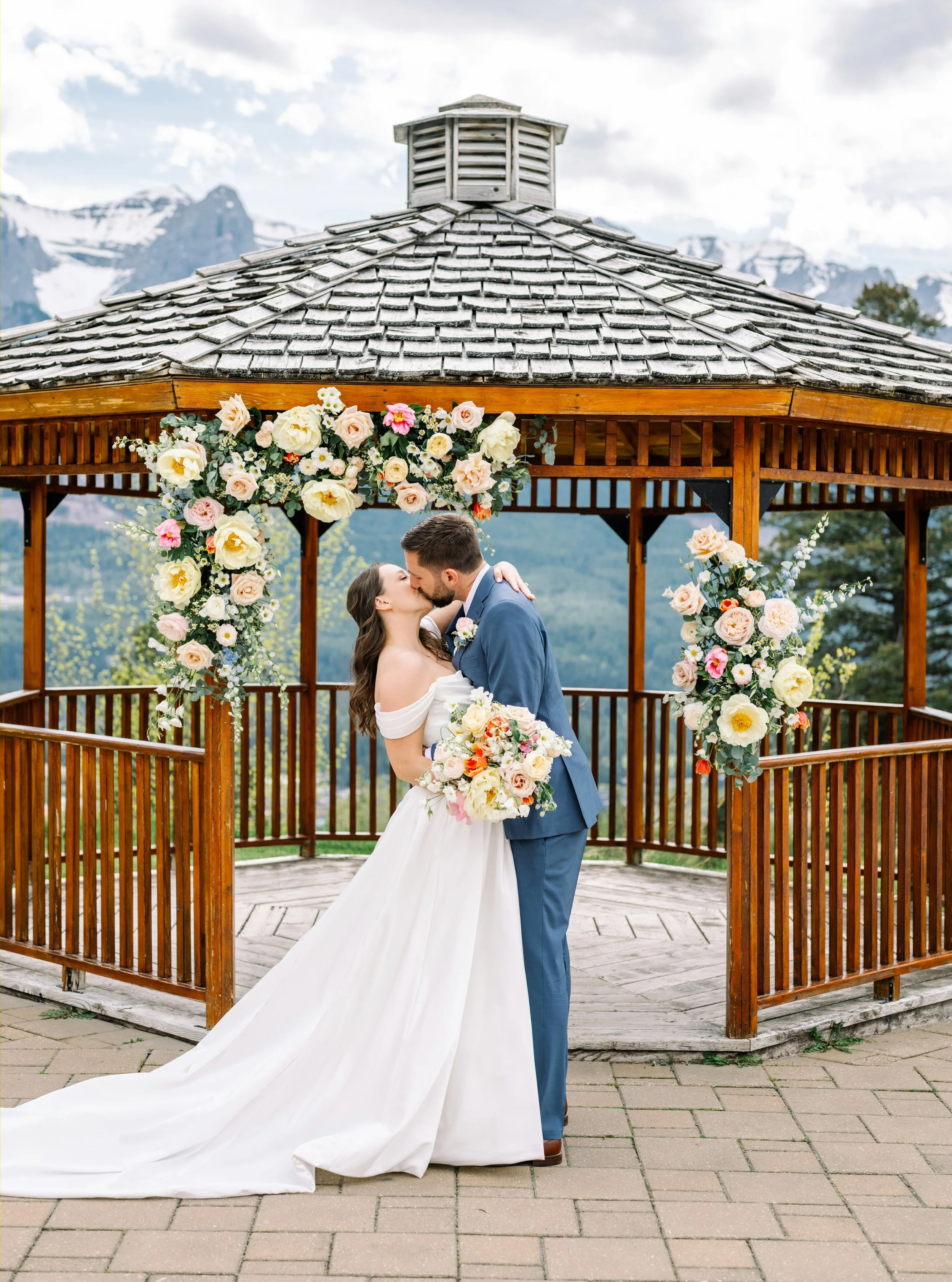 A wedding portrait is a formal or artistic photograph or painting of a newly married couple, designed to commemorate their union, beauty, and commitment. 
Congrats C&amp;K!

@willowflowerco 
@liliesandlacebeautyco
@silvertipresort

#canmorewedding #c