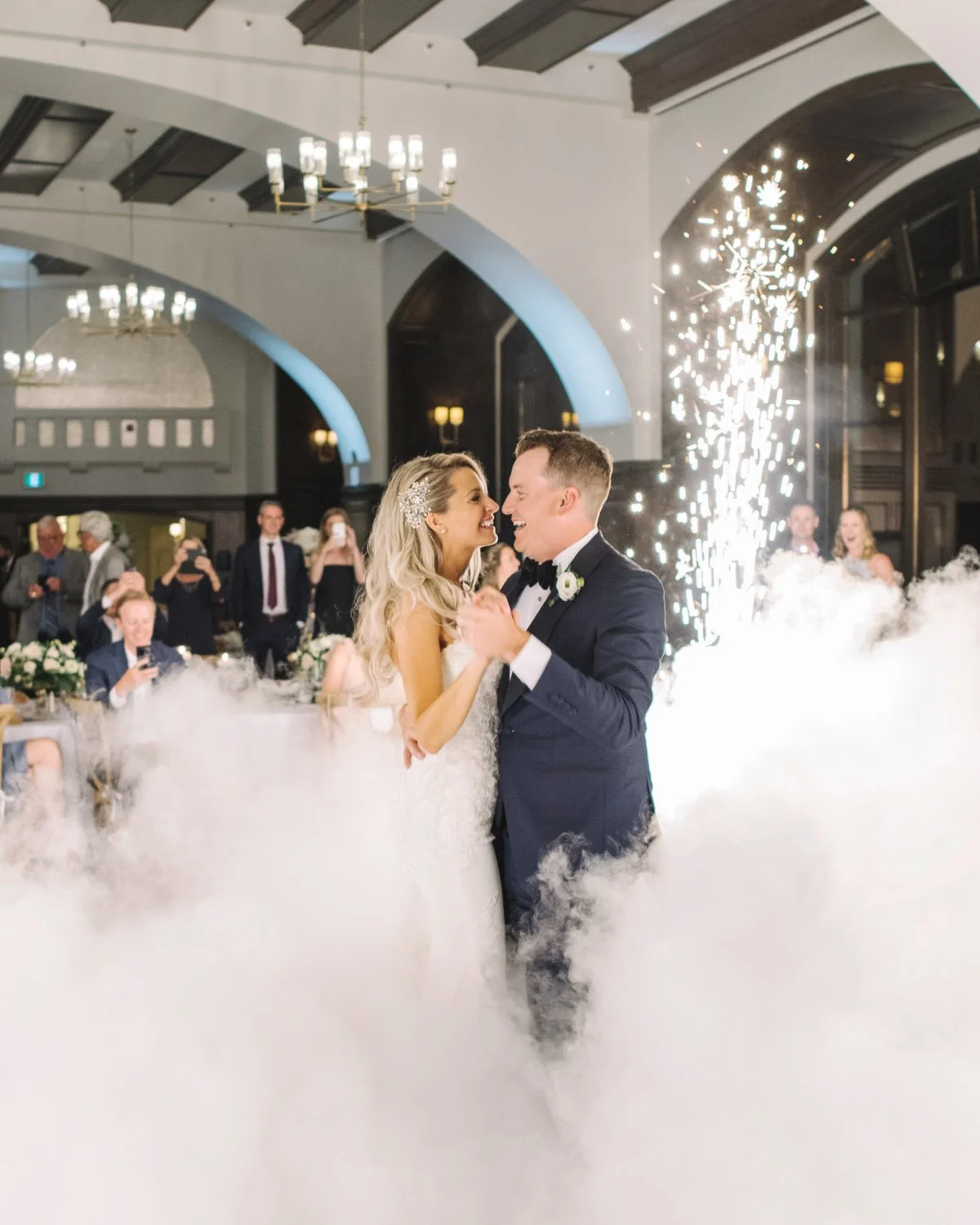 bride and groom first dance with sparklers 