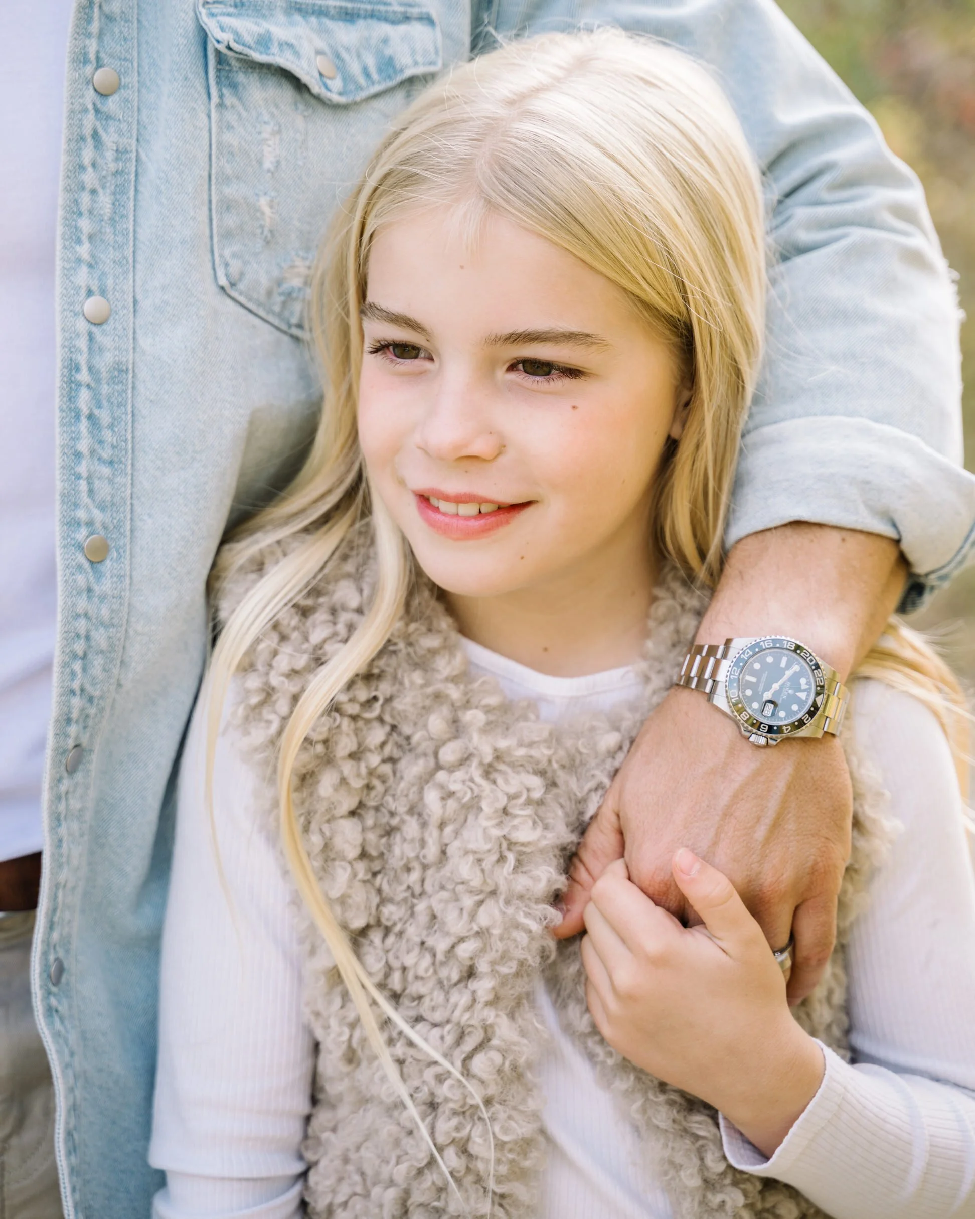 Father and daughter hand holding