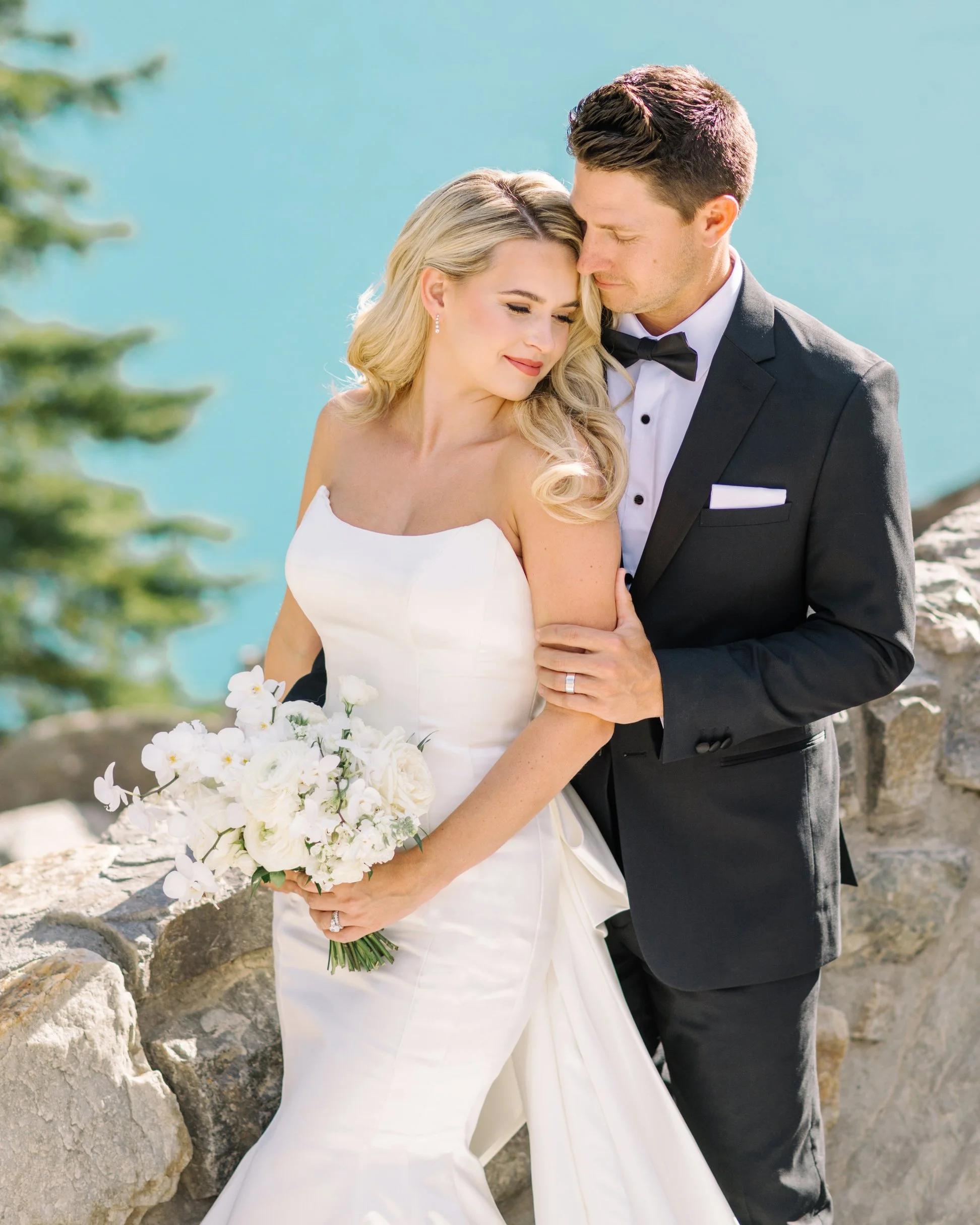 Bride and groom portraits at Moraine Lake in Banff