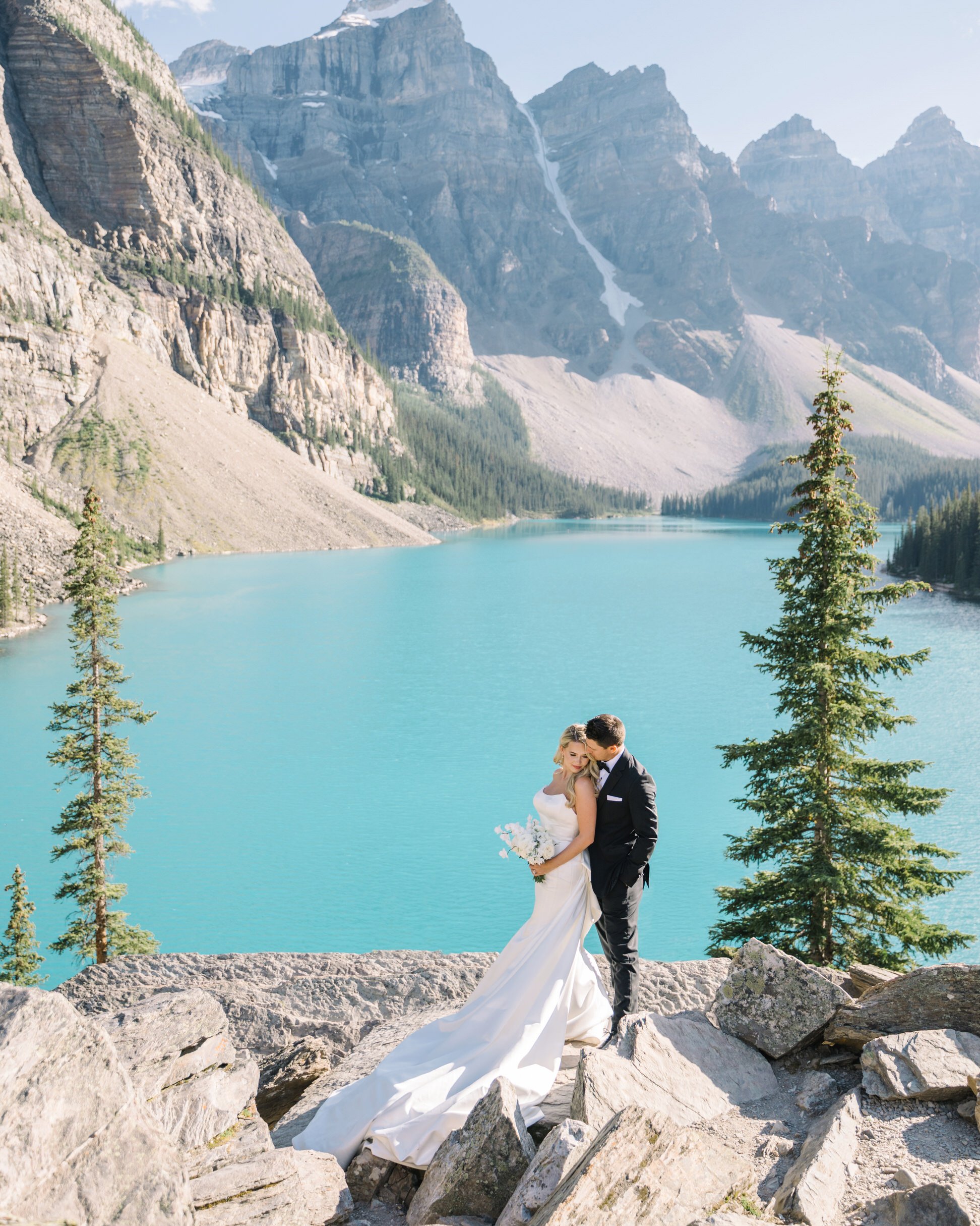 Bride and groom portraits at Moraine Lake in Banff