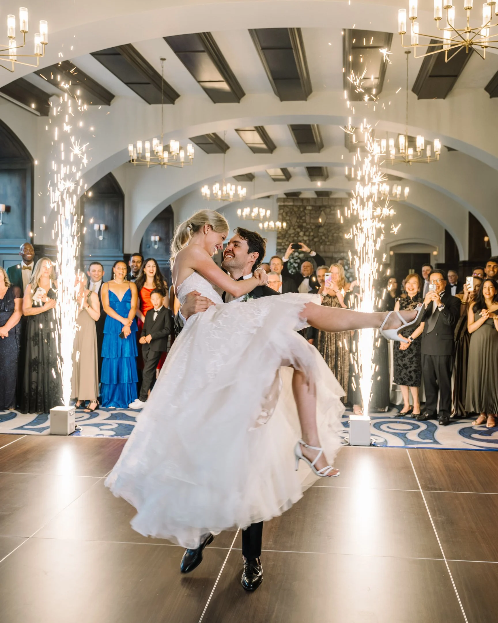 bride and groom first dance with sparklers 