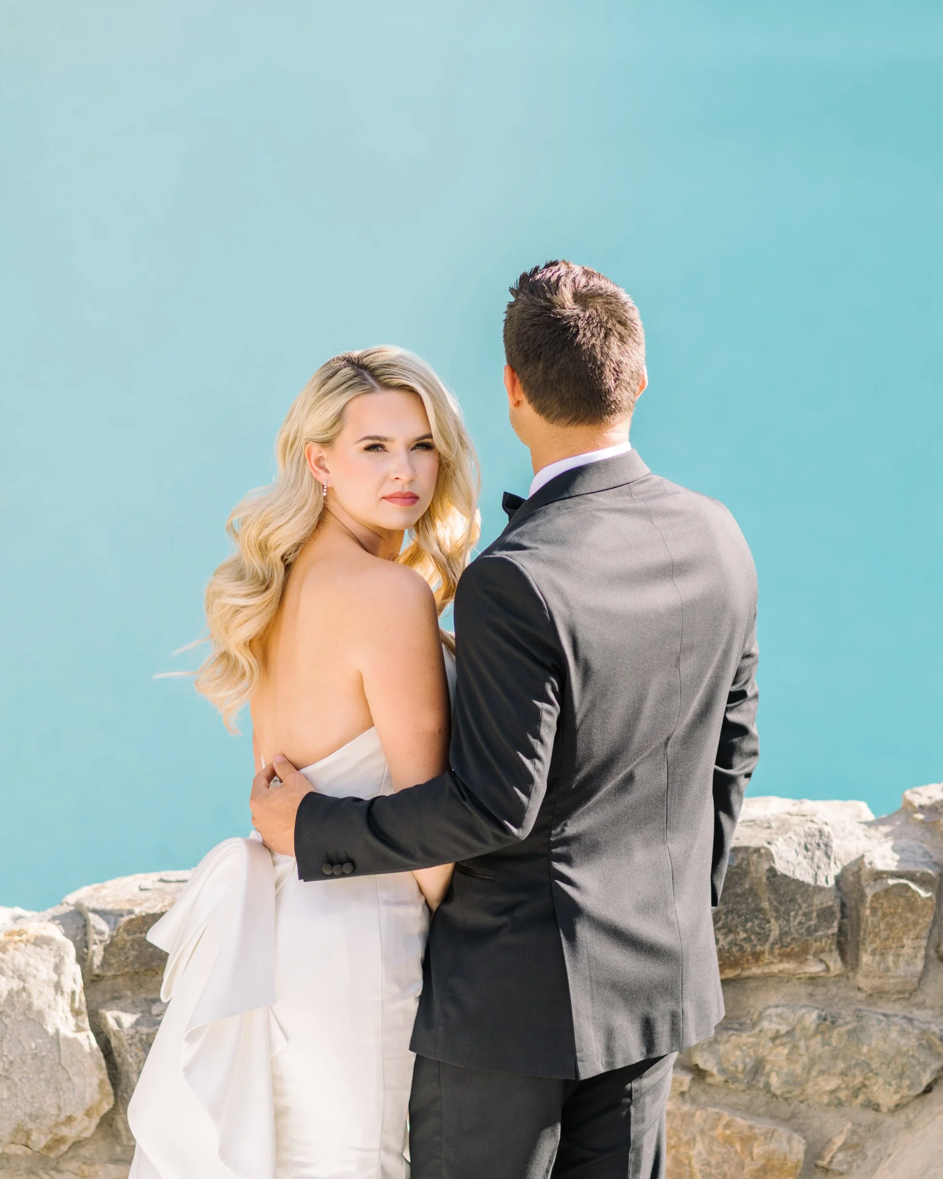 Bride and groom portraits at Moraine Lake in Banff