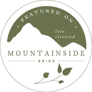 Mountainside Bride badge featuring mountain silhouette and leaves with text "Featured on Mountainside Bride - Love Elevated."