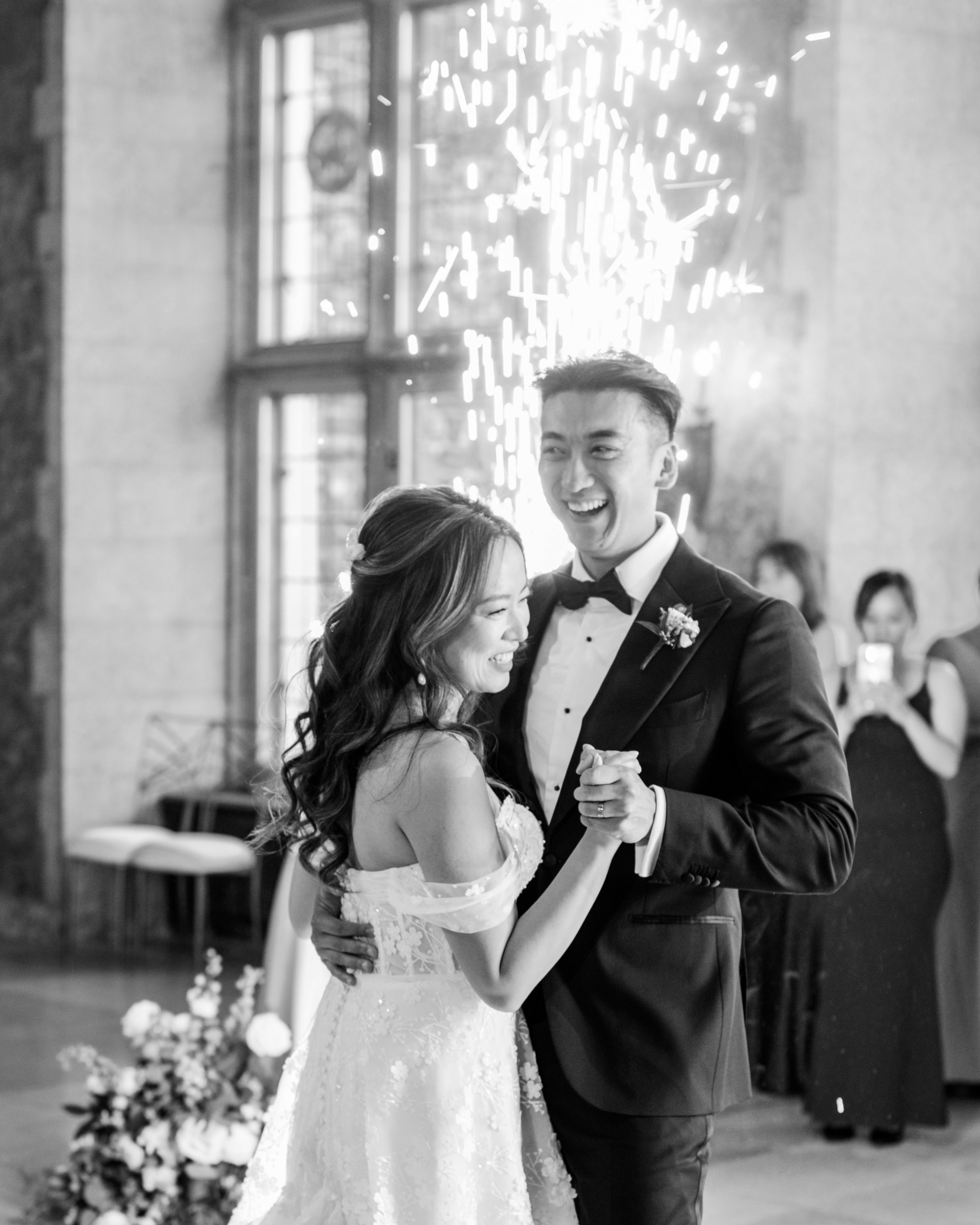 bride and groom first dance with sparklers 