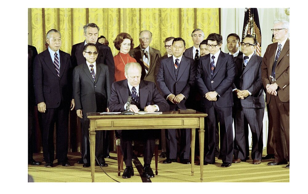 President Gerald R.Ford signs H.J. Resolution 549 into law on Feb. 24, 1976, to form the Commonwealth of the Northern Mariana Islands. Image courtesy of the Gerald R. Ford Presidential Library. 