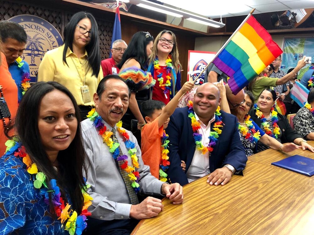 Lasia Casil, BJ Cruz, and Lt. Governor Joshua Tenorio at the 2019 Pride Month proclamation signing. (June 4, 2019)