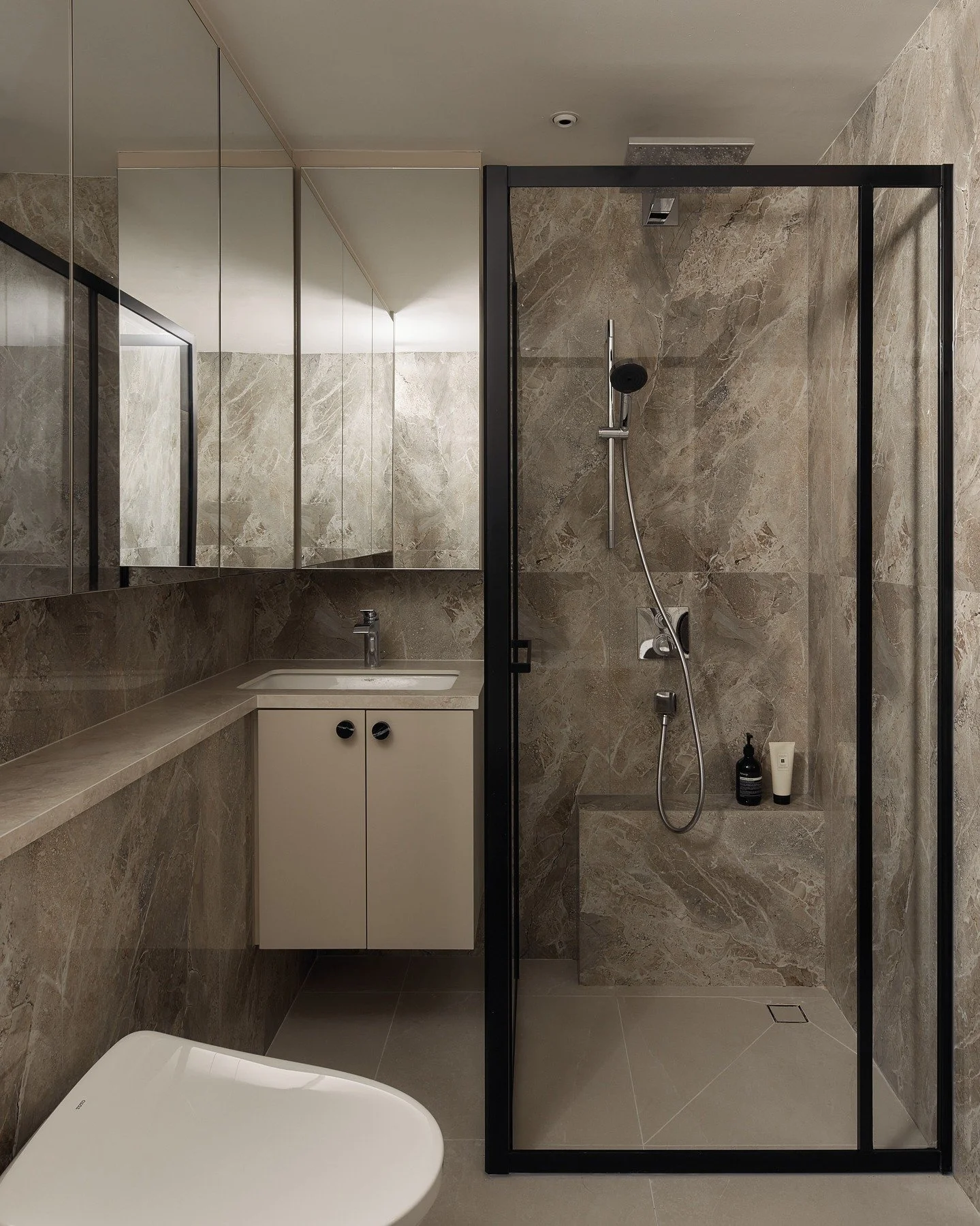 [Swipe right to see the bathroom before renovation]

What was once a dark dingy bathroom now houses an additional bath tub while maintaining a full size shower area.

This was made possible by shifting the bathroom entrance; one small move and sudden