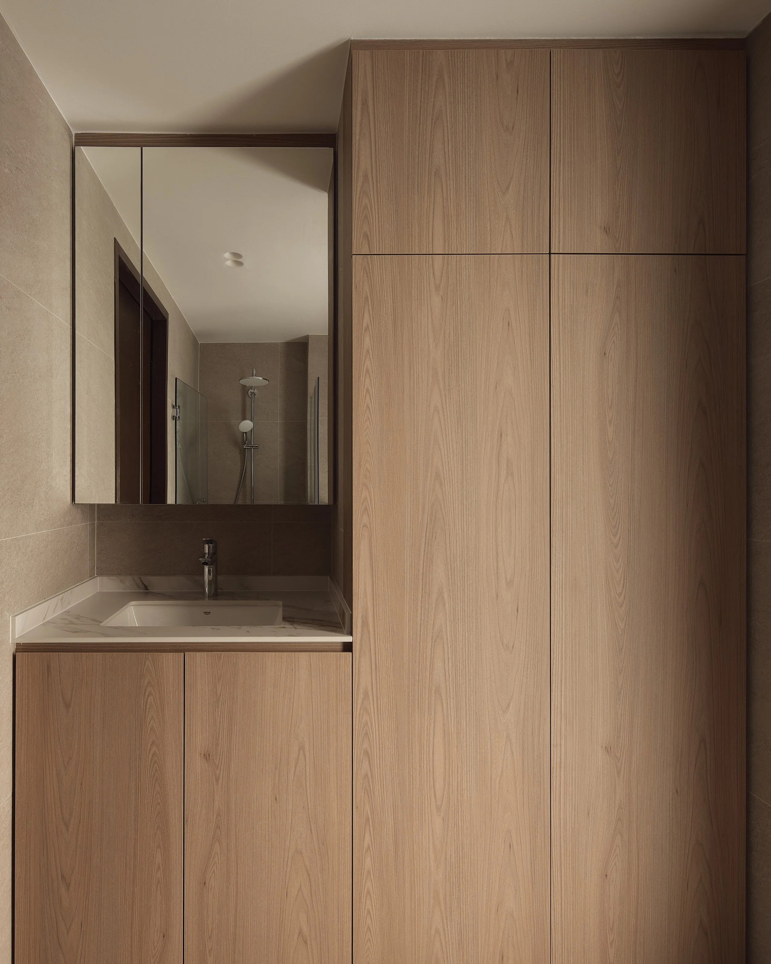 Since this 2-bedder condominium unit was to be rented out, the client decided it needed a refresh.

The brief was simple, revamp the bathrooms, make it a more comfortable space to use and minimise costs for the remainder of the house.

 And that's wh