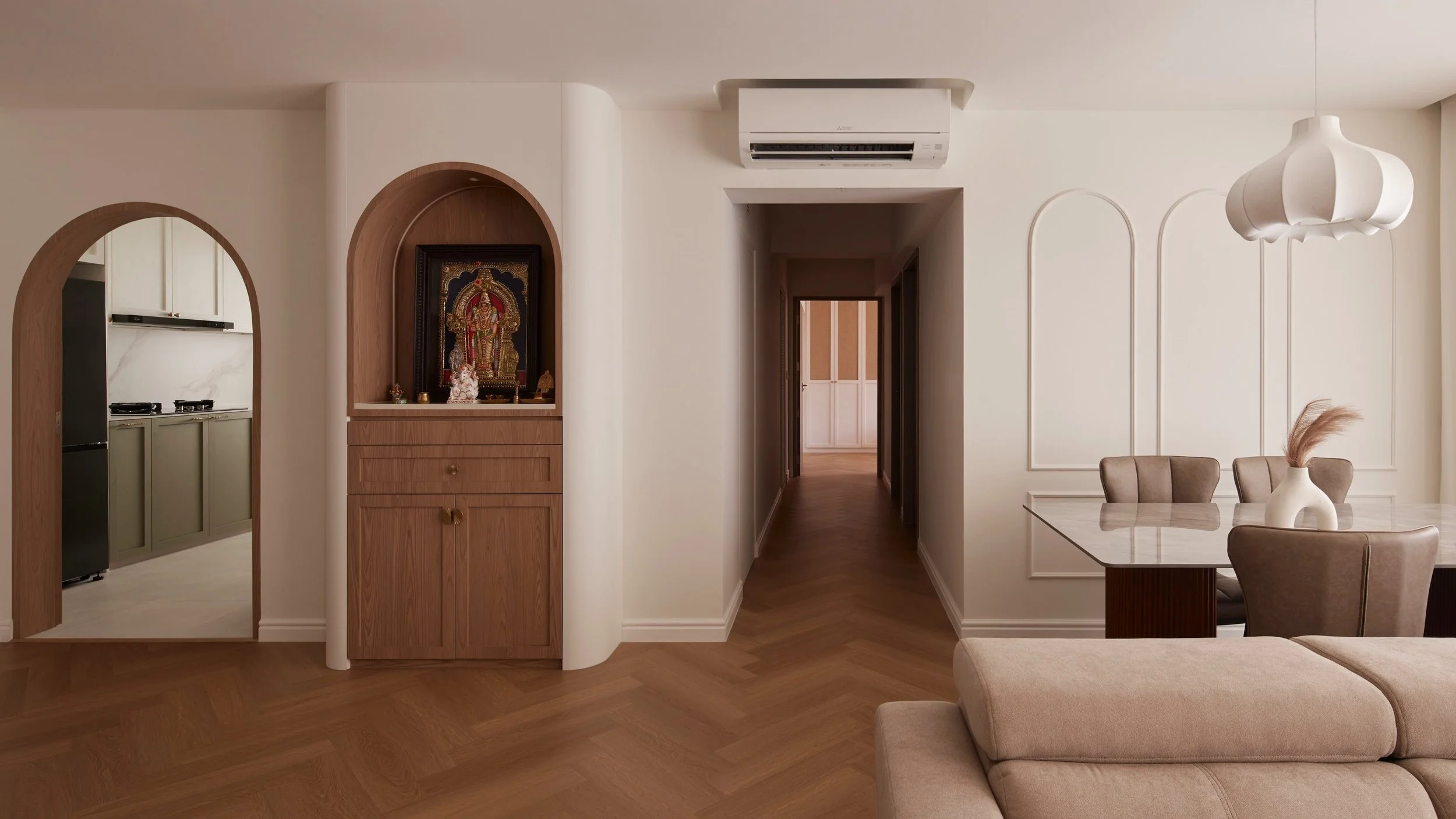 Home is for us and our deities. As tastes change, so too our altar designs. 

This one sits nicely within a space full of soft curves, light colours, gentle lighting and calm, reminding homeowners and all who enter this space, of the divinity within 