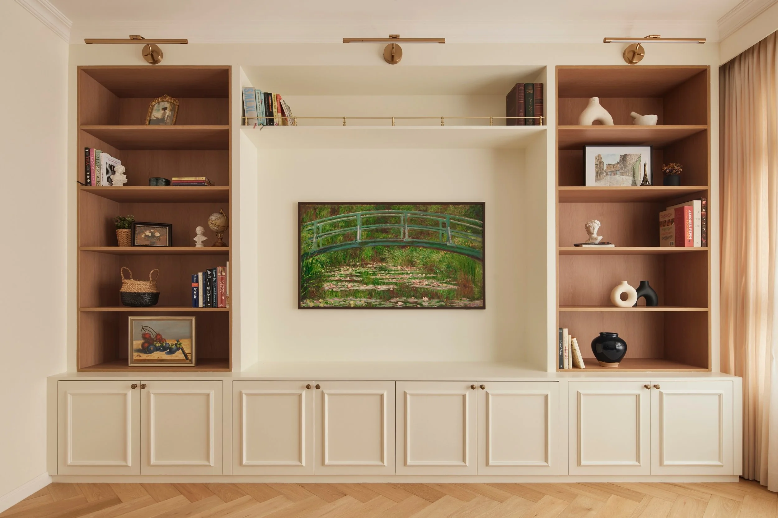 If you are wondering how there is so much space in the living room of a 4-room BTO, notice the beam above the sofa.

There, a wall once stood. 

It was removed and a new one built further in. The shrunken room still fits all of our clients' needs, li