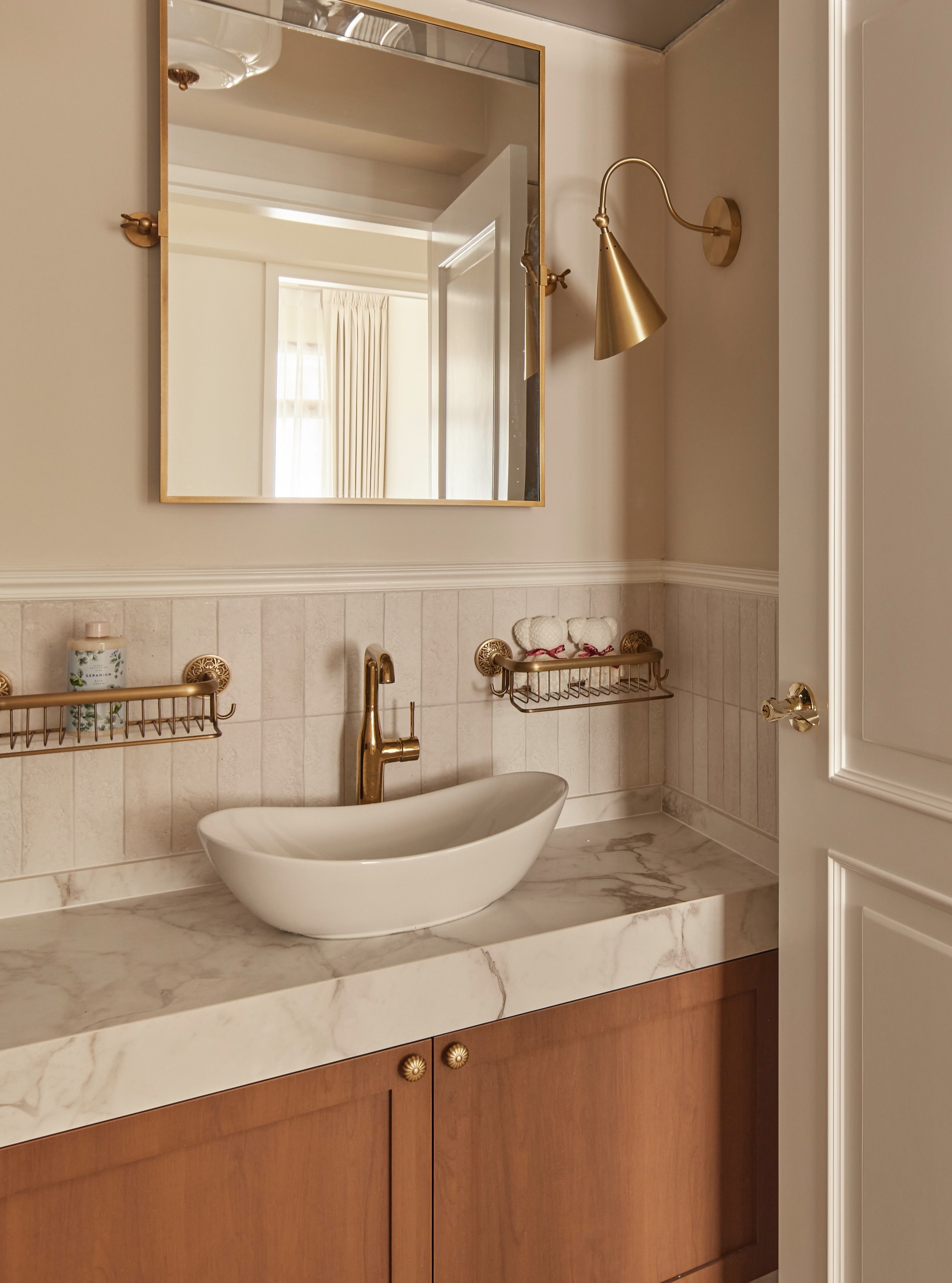 In Singapore, it&rsquo;s generally considered safer to tile the entire bathroom. 

Here though, the clients were adventurous enough to accept a suggestion for the top half of some walls to be painted.

Those walls are less likely to get soaking wet. 